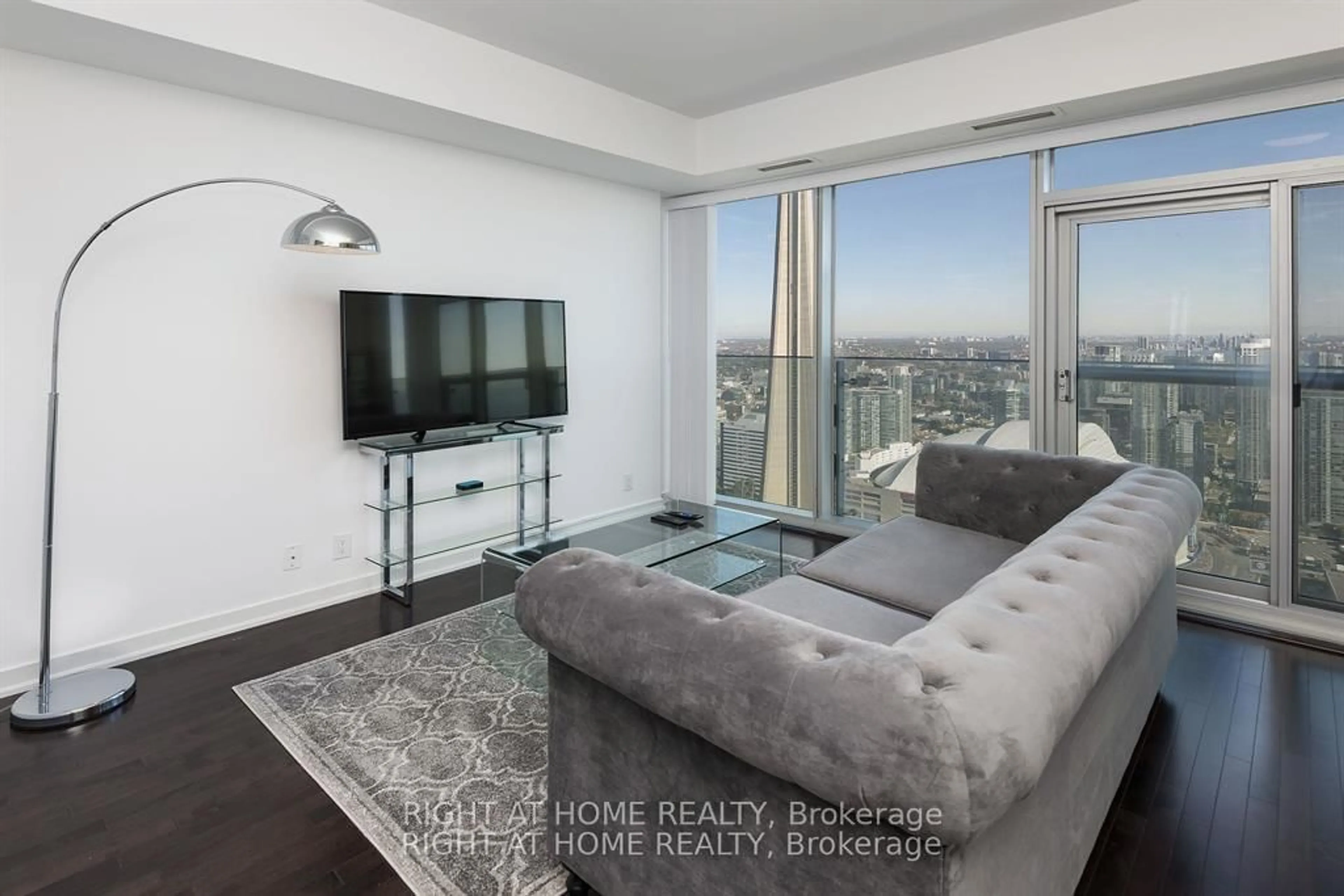 Living room with furniture, unknown for 12 York St #4906, Toronto Ontario M5J 2Z2