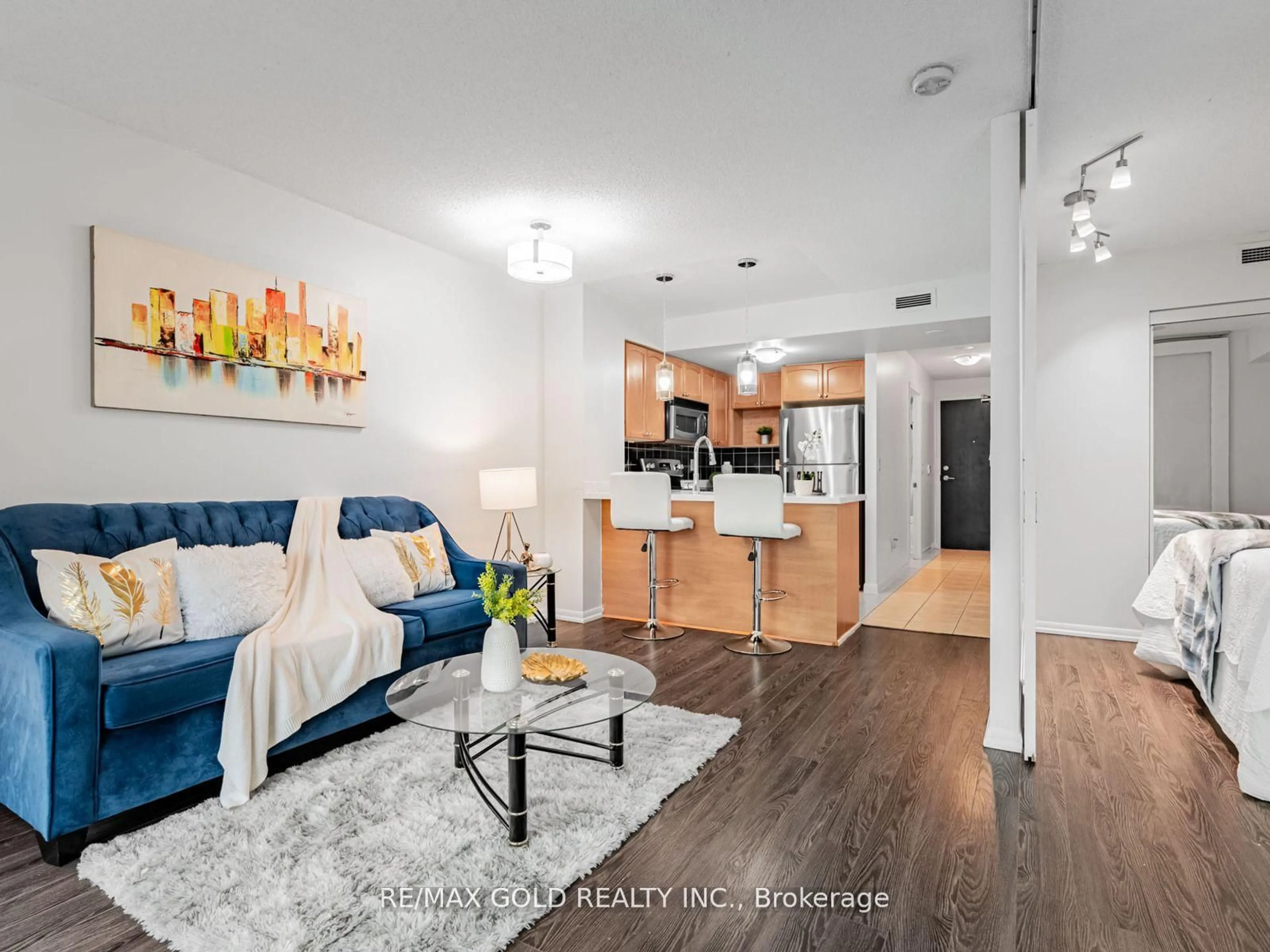 Living room with furniture, unknown for 18 Yonge St #906, Toronto Ontario M5E 1R4