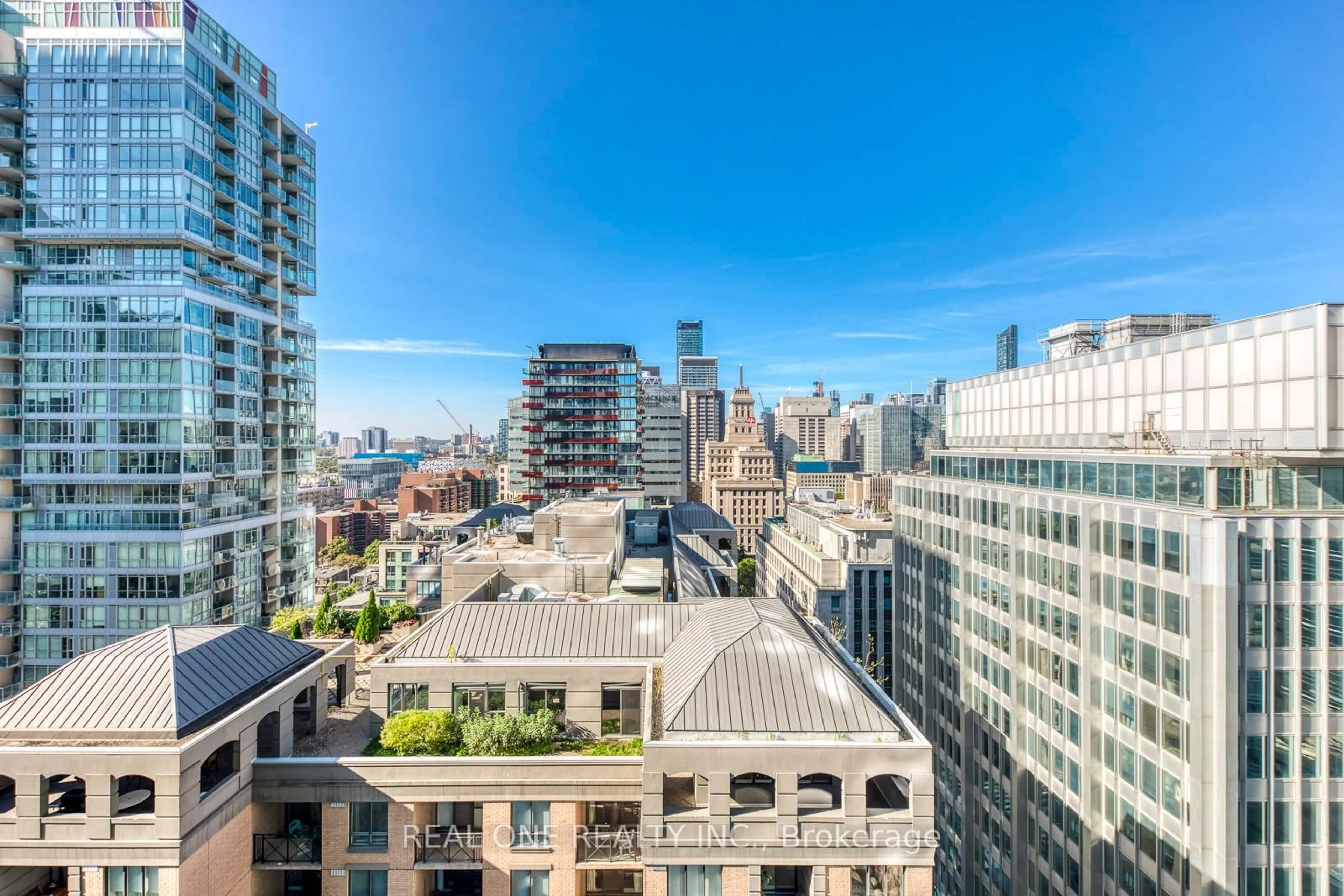 Patio, city buildings view from balcony for 126 Simcoe St #2007, Toronto Ontario M5H 4E6