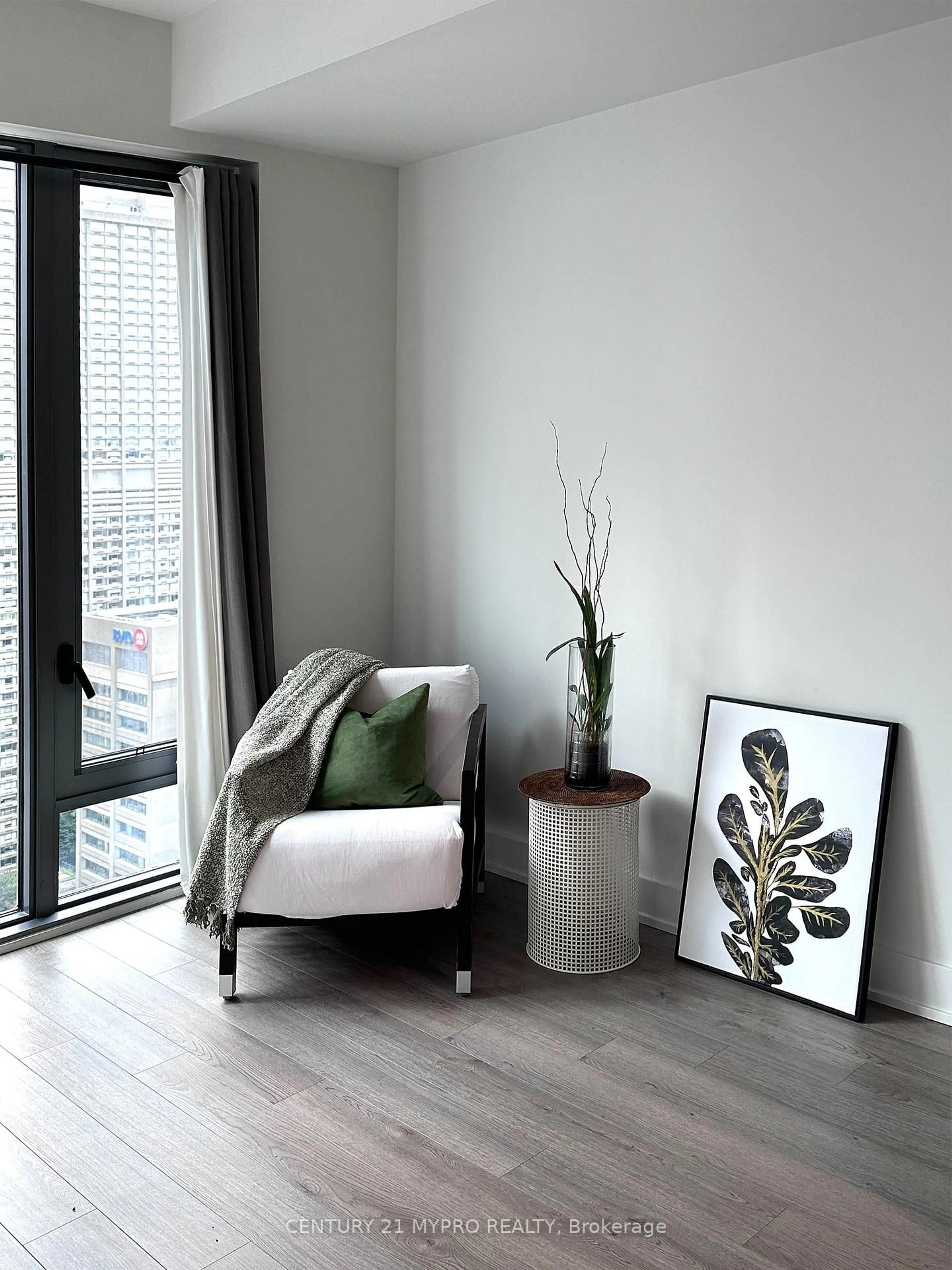 Living room with furniture, wood/laminate floor for 8 Cumberland St #3104, Toronto Ontario M4W 0B6