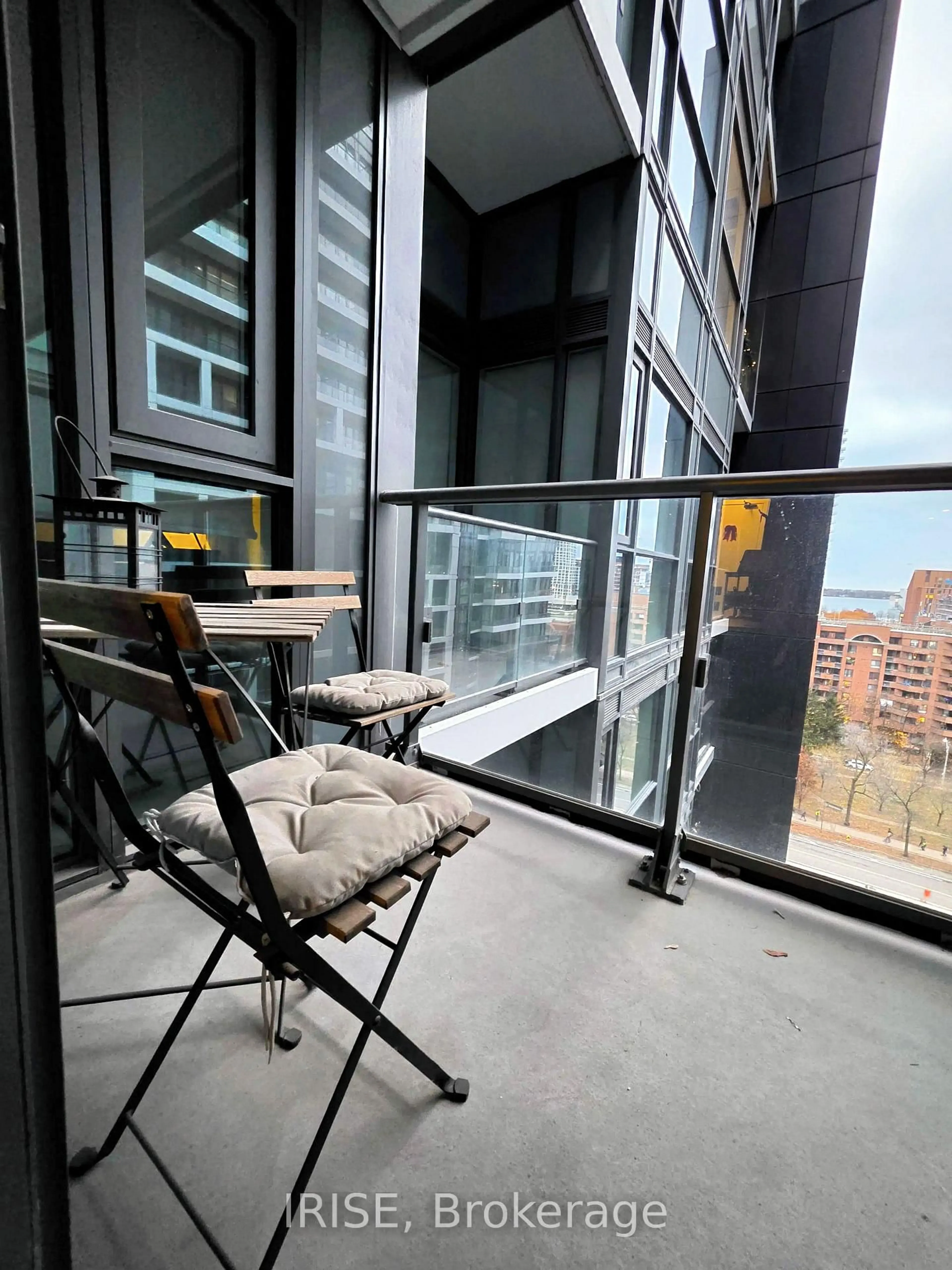 Balcony in the apartment, city buildings view from balcony for 70 Princess St #1034, Toronto Ontario M5A 0X6