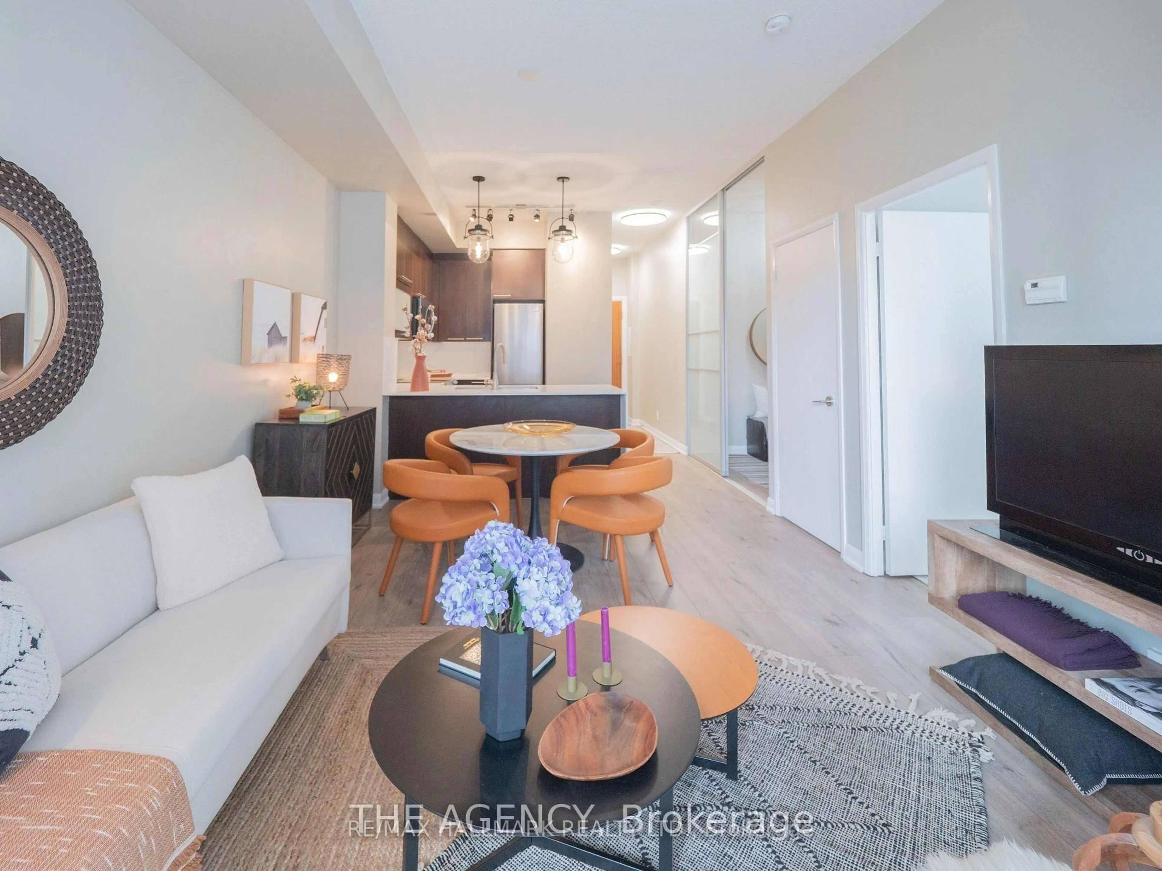 Living room with furniture, wood/laminate floor for 500 Sherbourne St #507, Toronto Ontario M4X 1L1