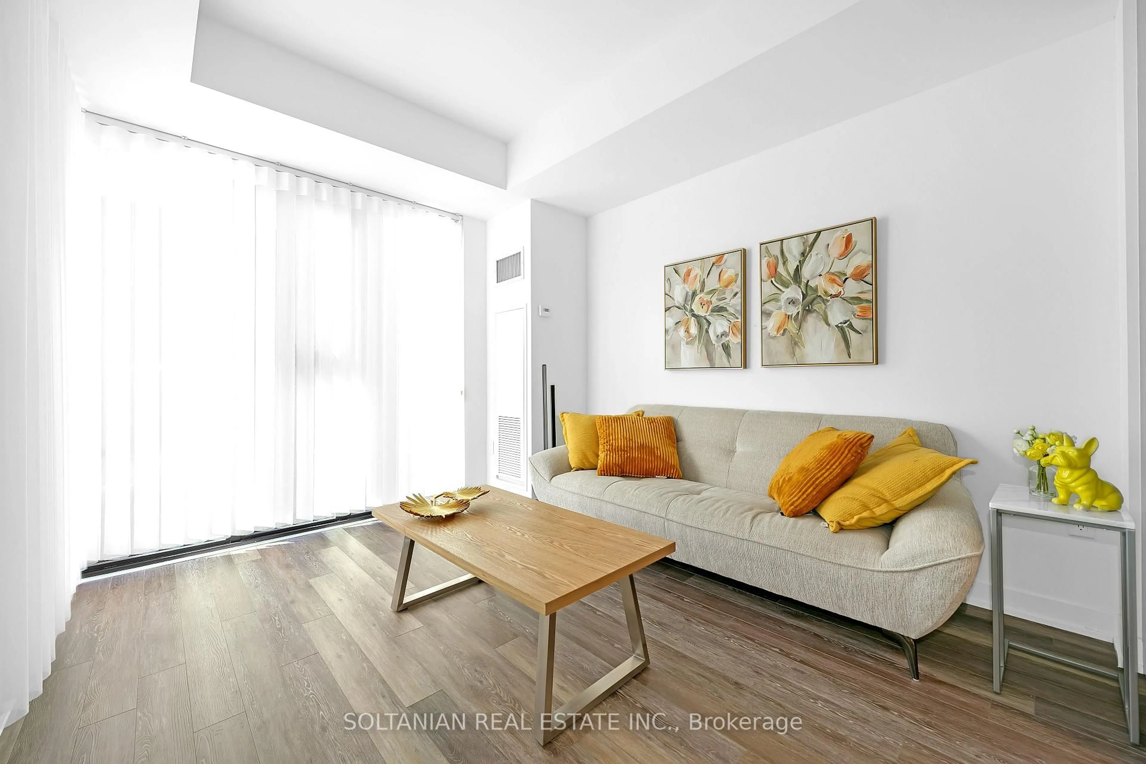 Living room with furniture, wood/laminate floor for 250 Lawrence Ave #320, Toronto Ontario M5M 1B1