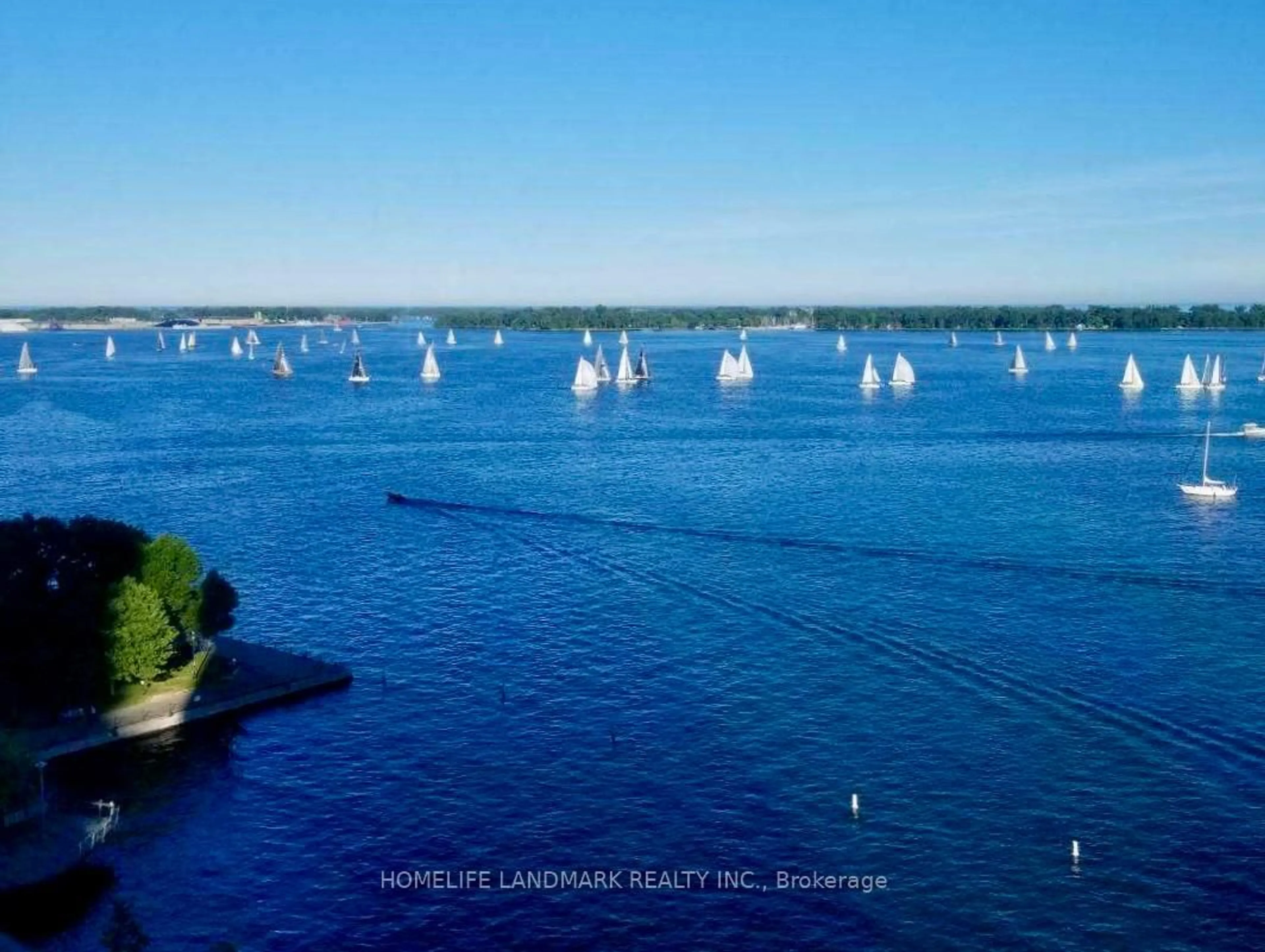 A pic from outside/outdoor area/front of a property/back of a property/a pic from drone, water/lake/river/ocean view for 99 Harbour Sq #1505, Toronto Ontario M5J 2H2