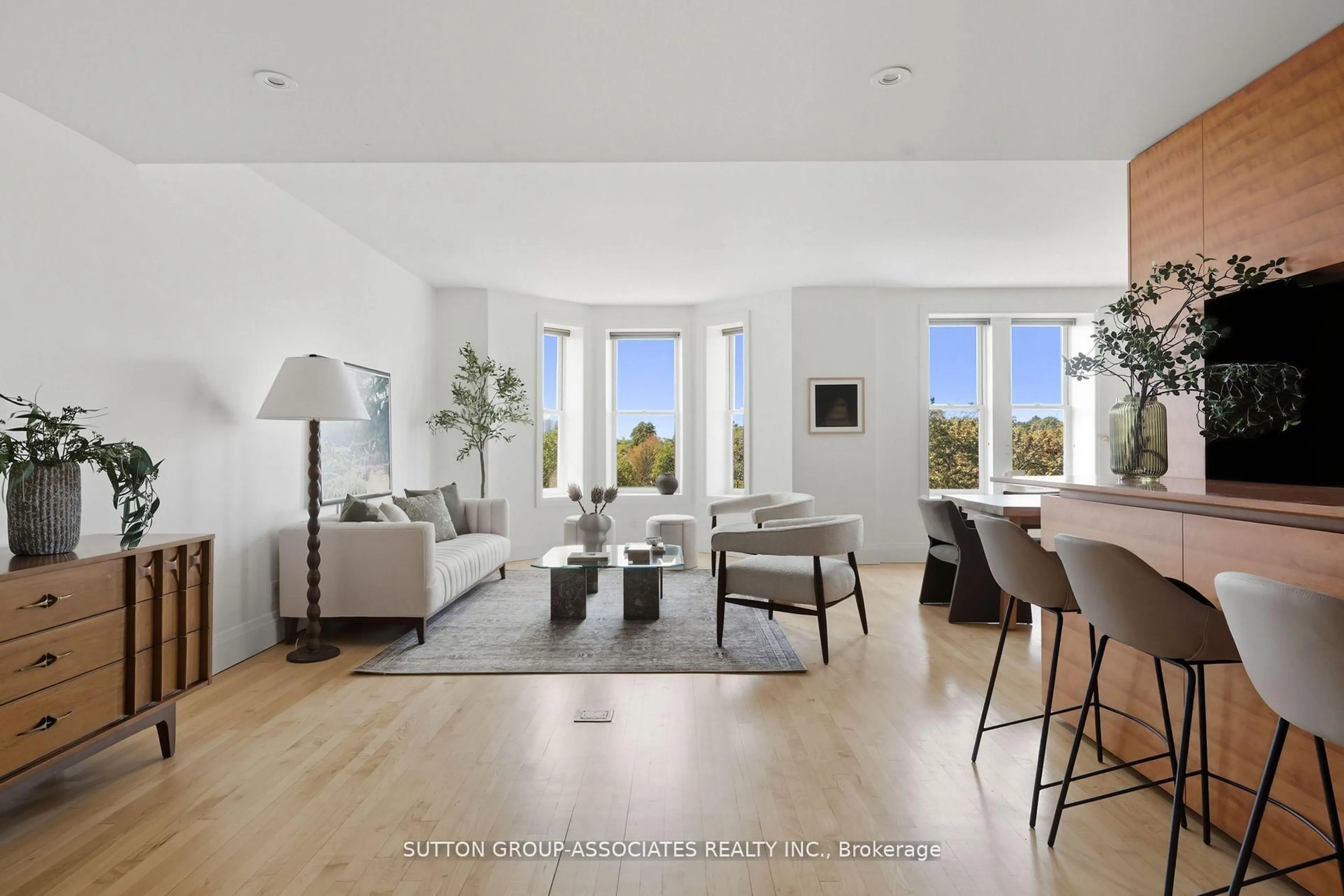 Living room with furniture, wood/laminate floor for 385 Brunswick Ave #408, Toronto Ontario M5R 3R1