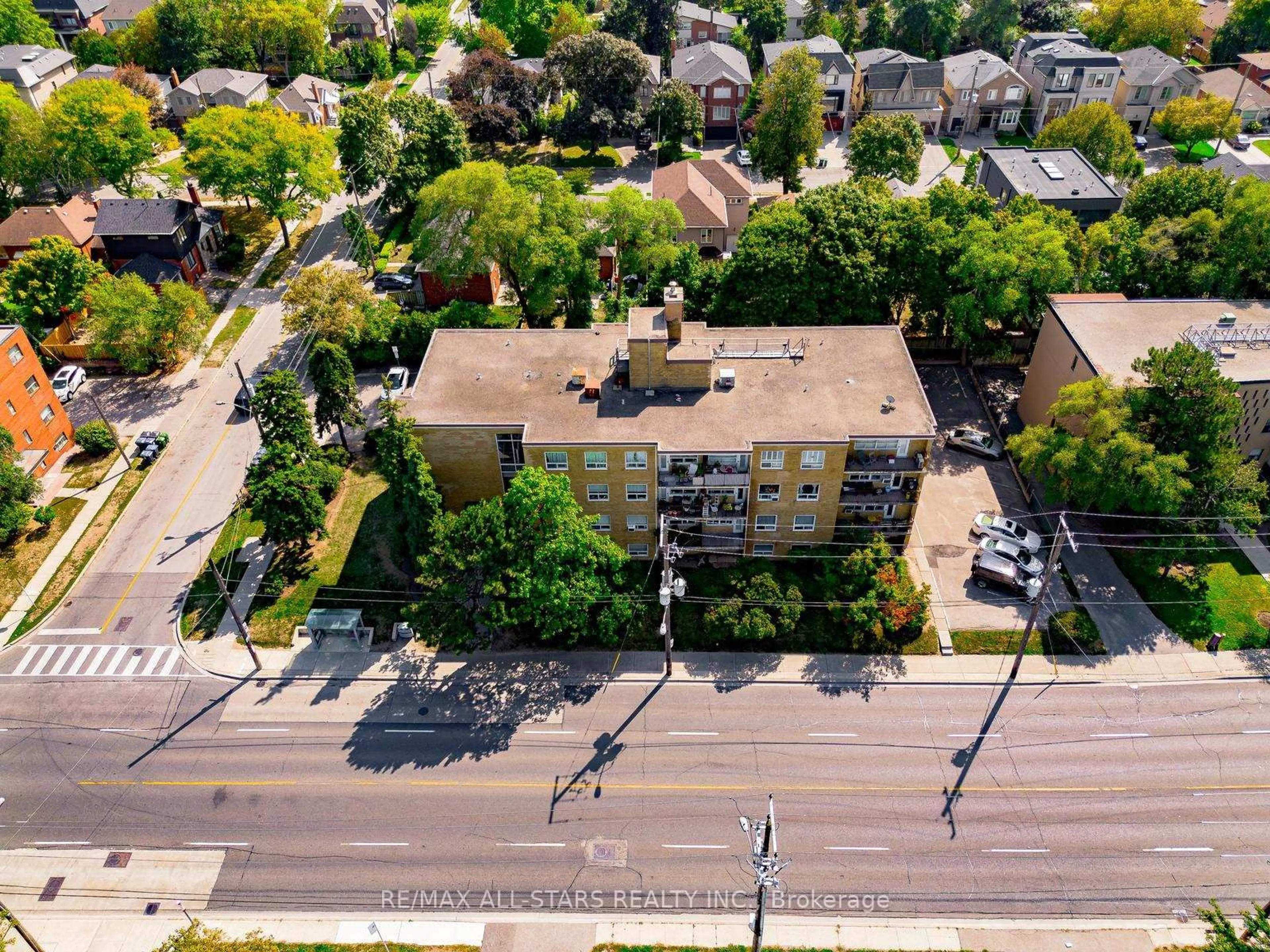 A pic from outside/outdoor area/front of a property/back of a property/a pic from drone, unknown for 219 Wilson Ave #201, Toronto Ontario M5M 3B2