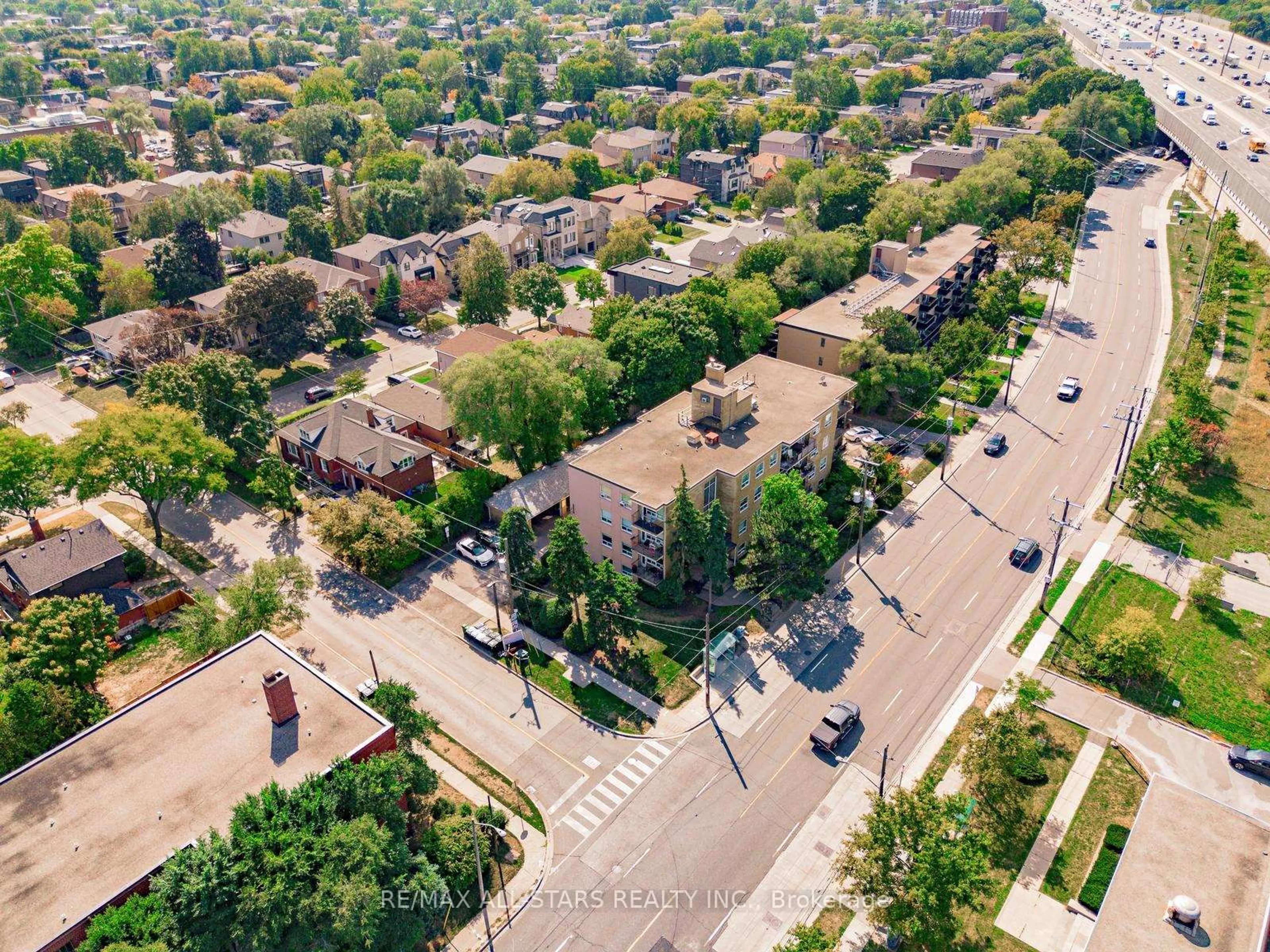 A pic from outside/outdoor area/front of a property/back of a property/a pic from drone, street for 219 Wilson Ave #201, Toronto Ontario M5M 3B2