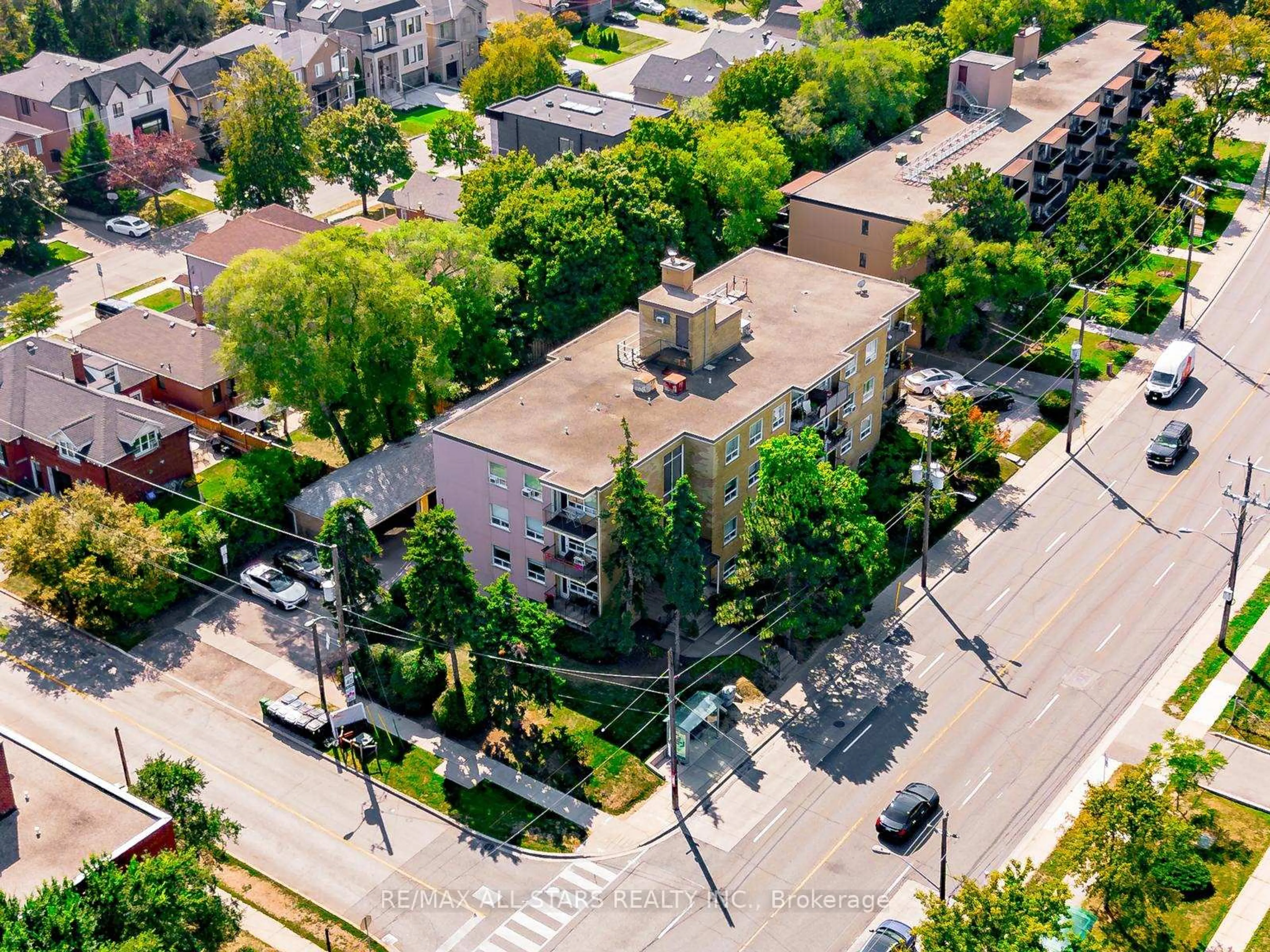 A pic from outside/outdoor area/front of a property/back of a property/a pic from drone, street for 219 Wilson Ave #201, Toronto Ontario M5M 3B2