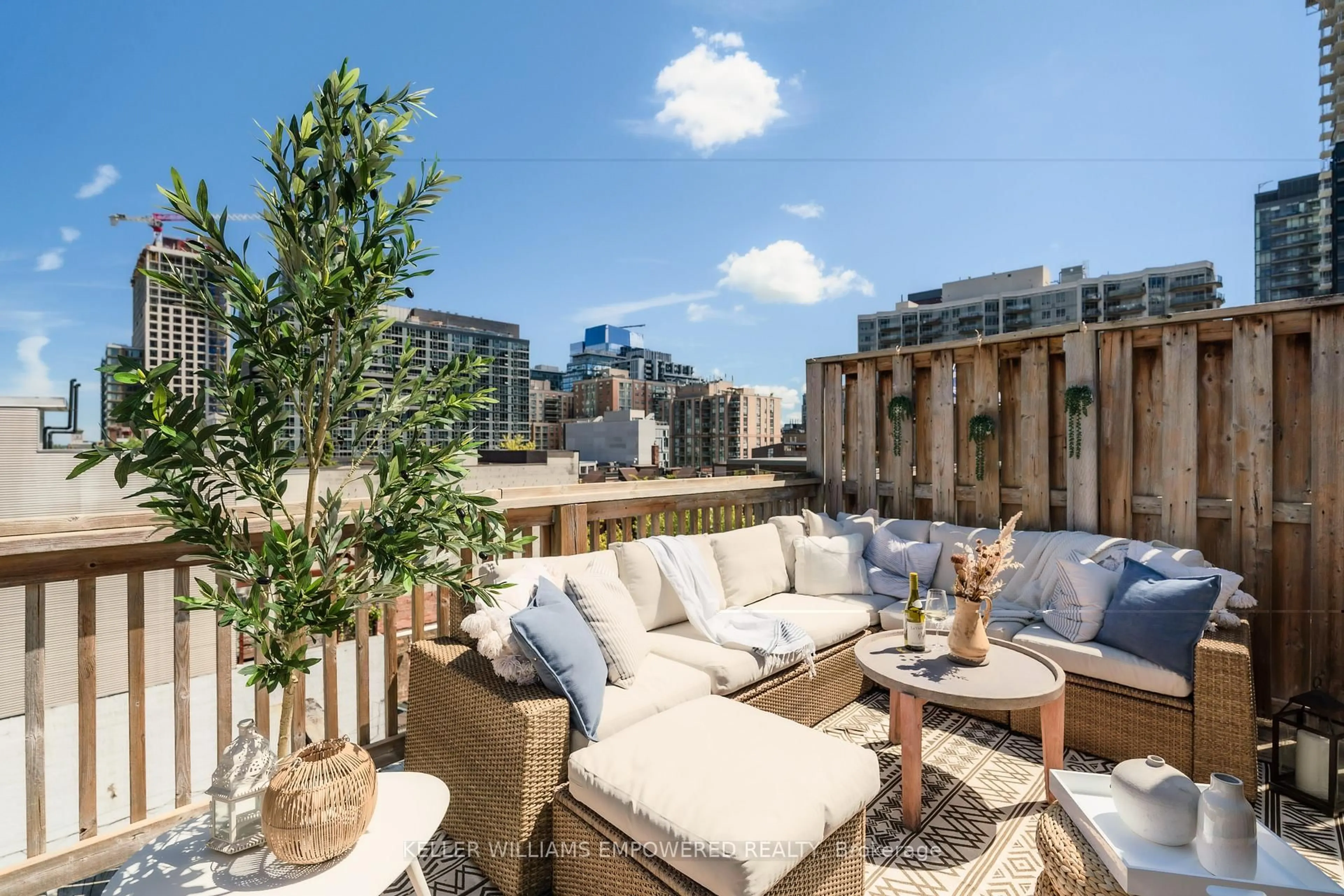 Patio, city buildings view from balcony for 189 Queen St #5, Toronto Ontario M5A 1S2