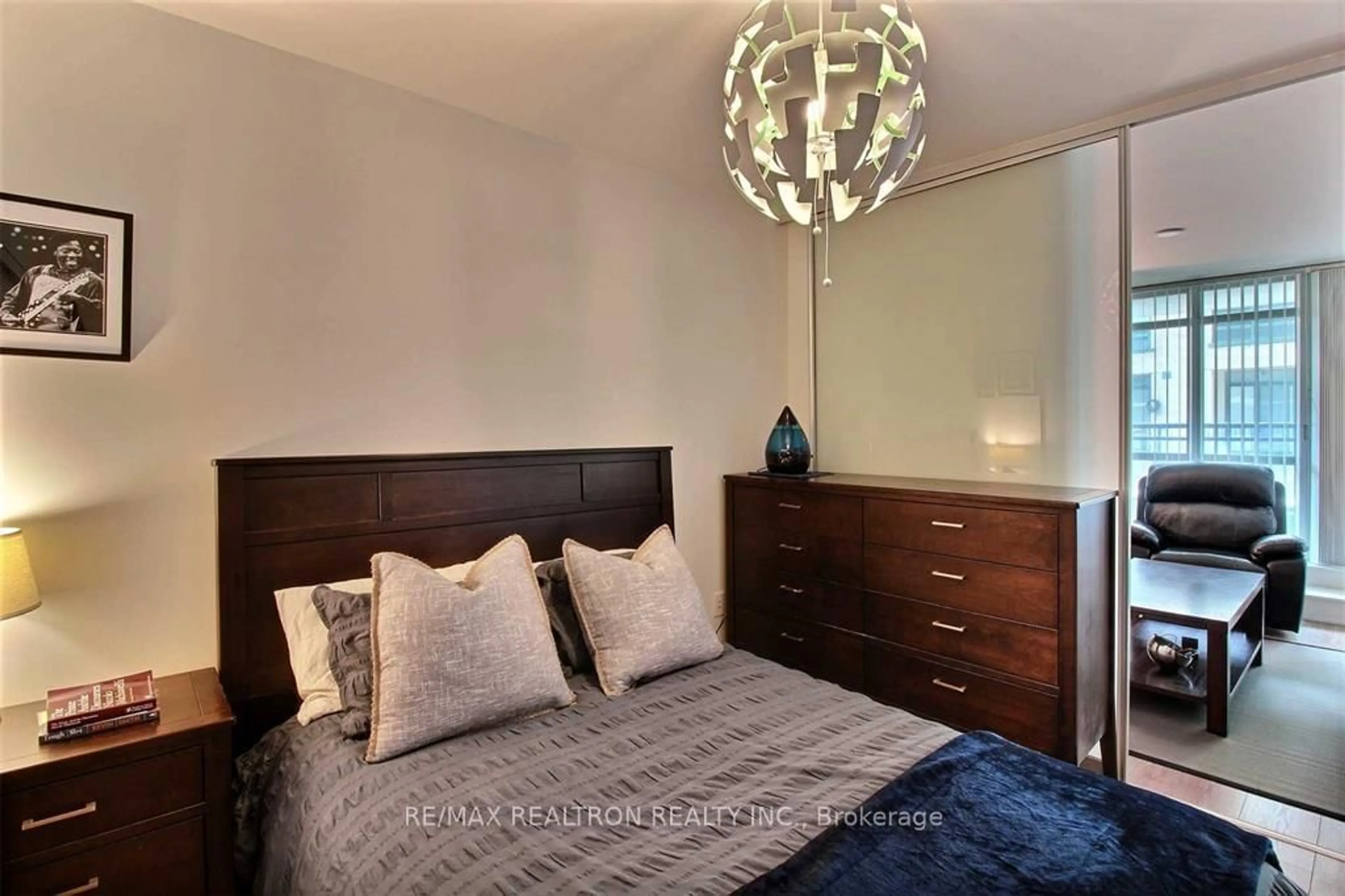 Bedroom with bed, wood/laminate floor for 775 King St #206, Toronto Ontario M5V 2K3