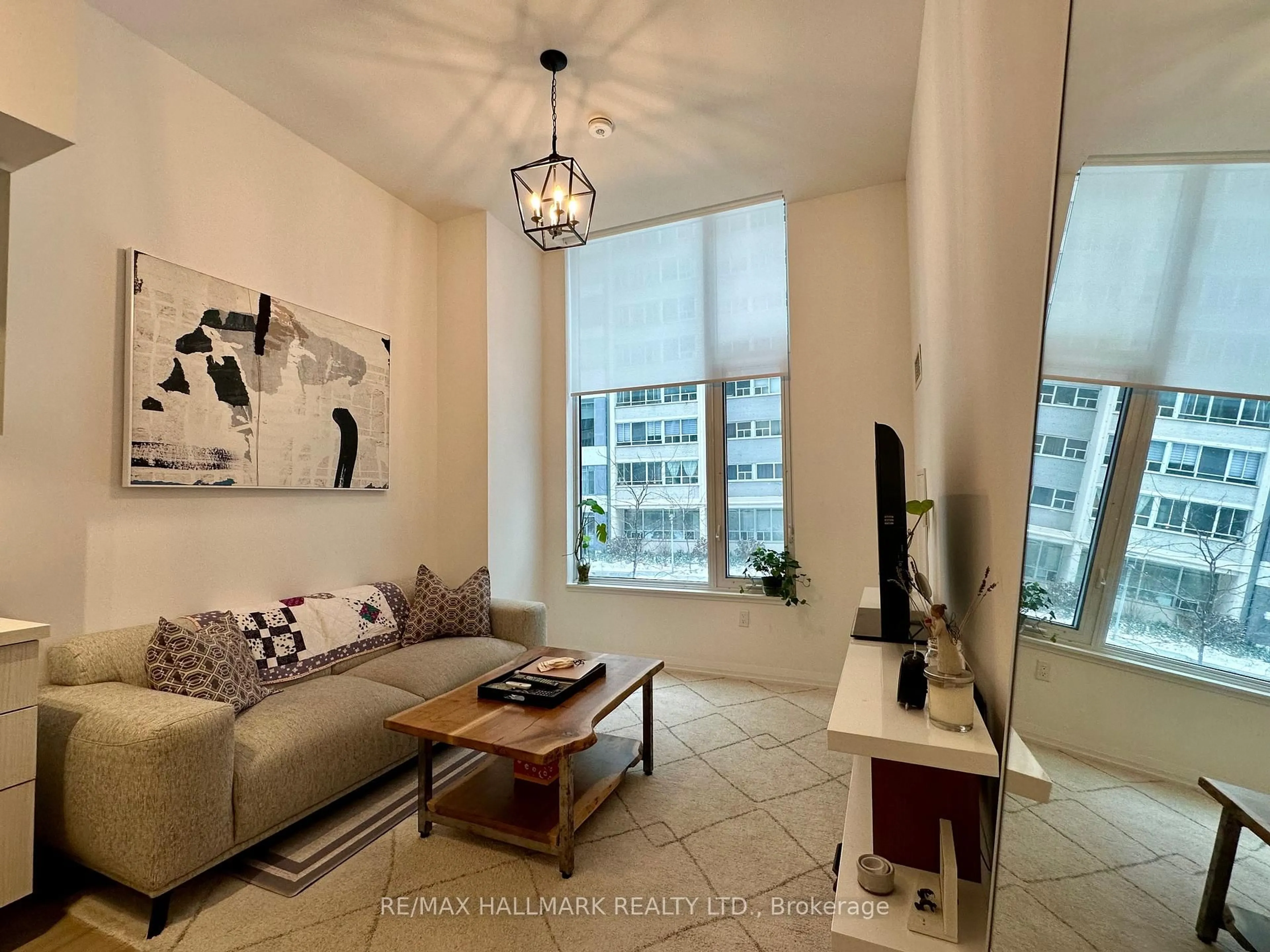 Living room with furniture, unknown for 50 Dunfield Ave #214, Toronto Ontario M4S 0E4