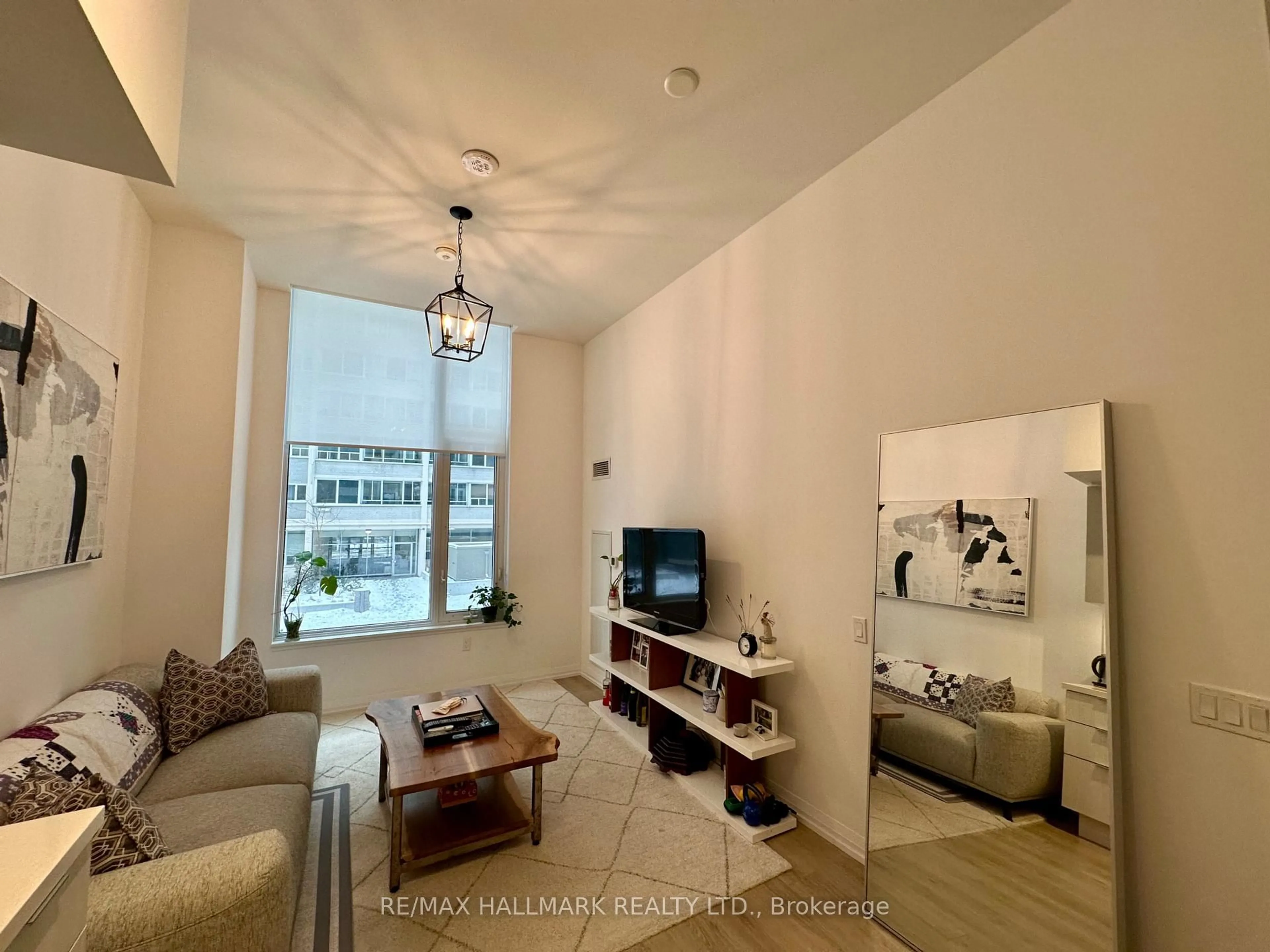 Living room with furniture, unknown for 50 Dunfield Ave #214, Toronto Ontario M4S 0E4