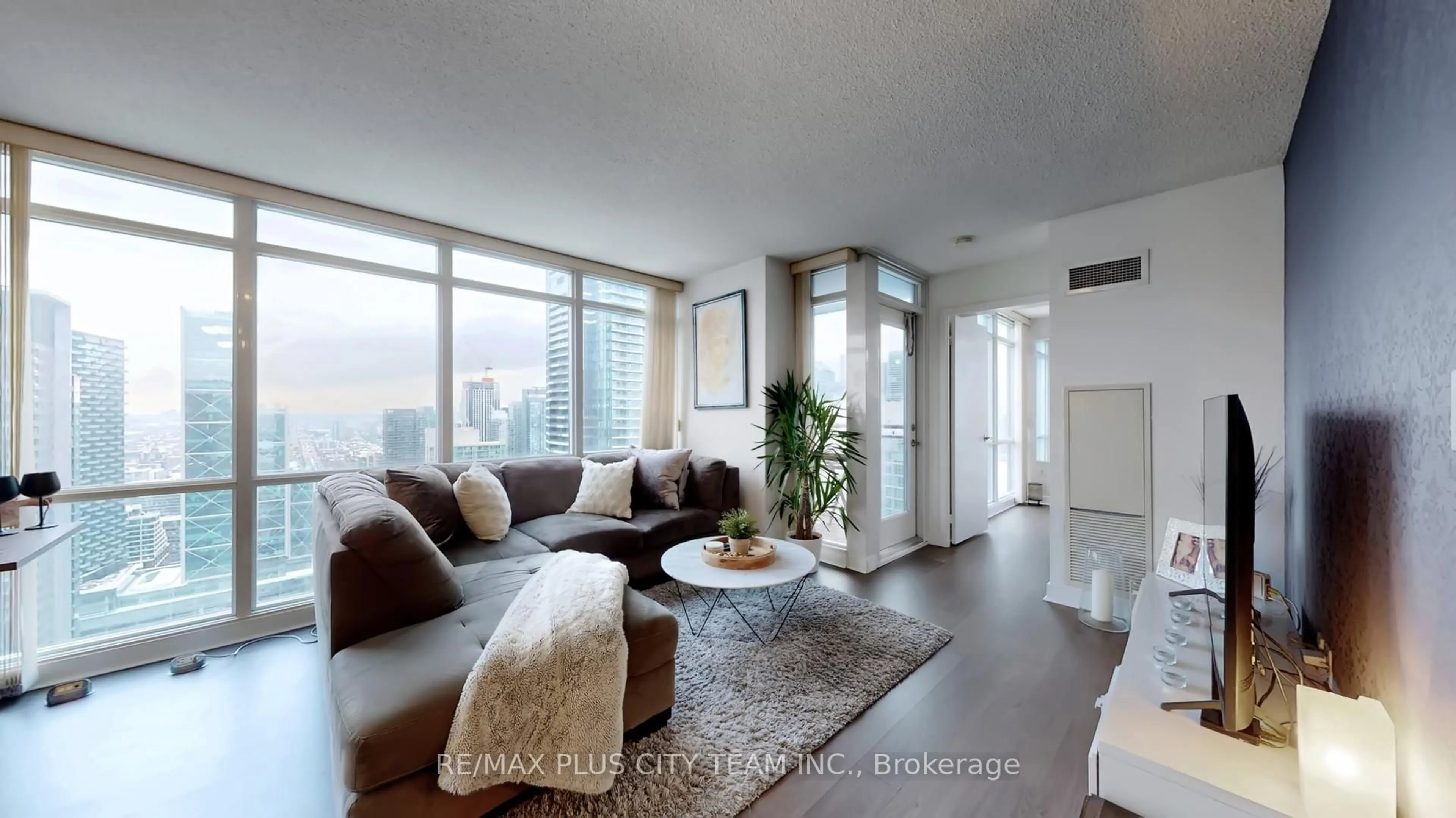 Living room with furniture, unknown for 11 Brunel Crt #5106, Toronto Ontario M5V 3Y3