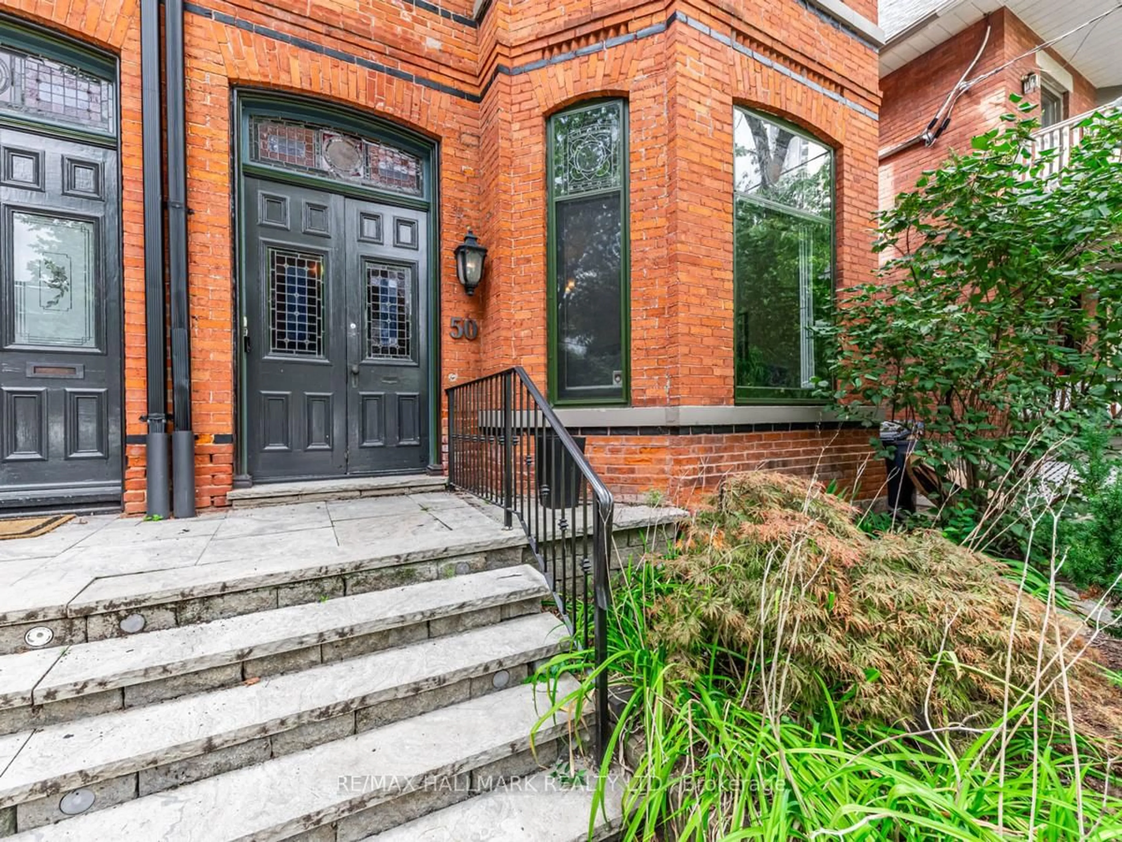 Home with brick exterior material, street for 50 Rose Ave, Toronto Ontario M4X 1N9