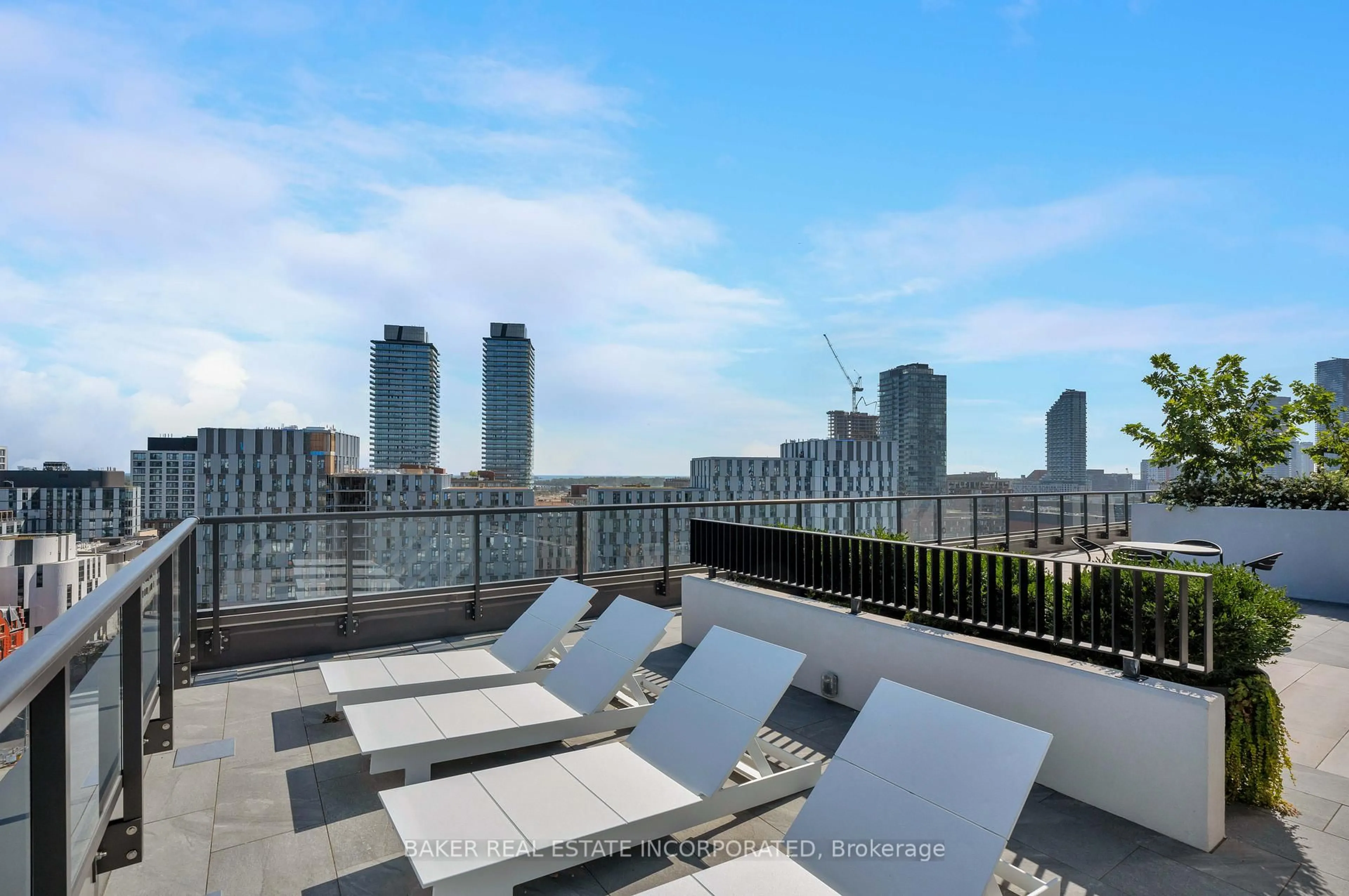 Patio, city buildings view from balcony for 28 Eastern Ave #524, Toronto Ontario M5A 0Y2