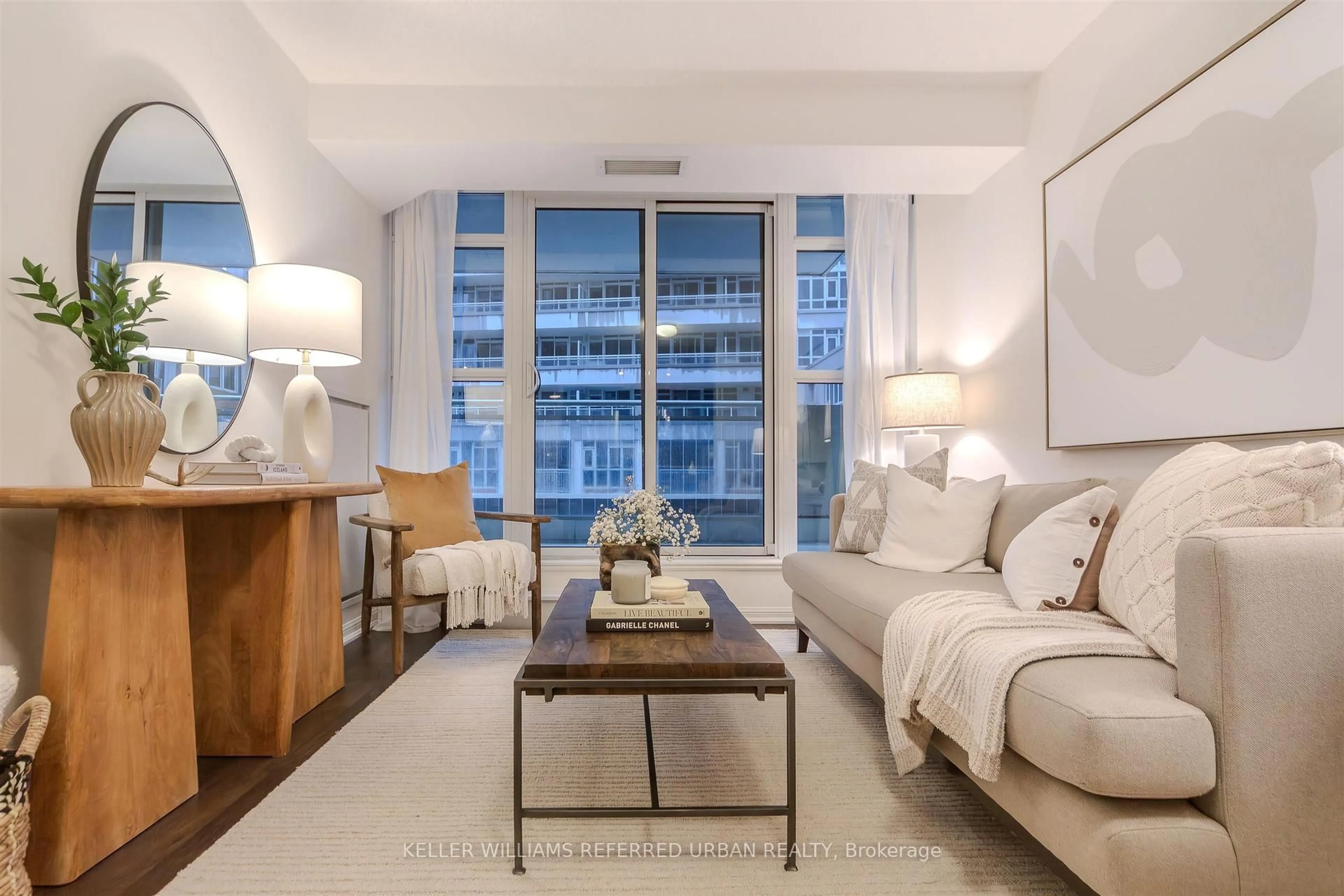 Living room with furniture, unknown for 38 Grand Magazine St #744, Toronto Ontario M5V 0B2