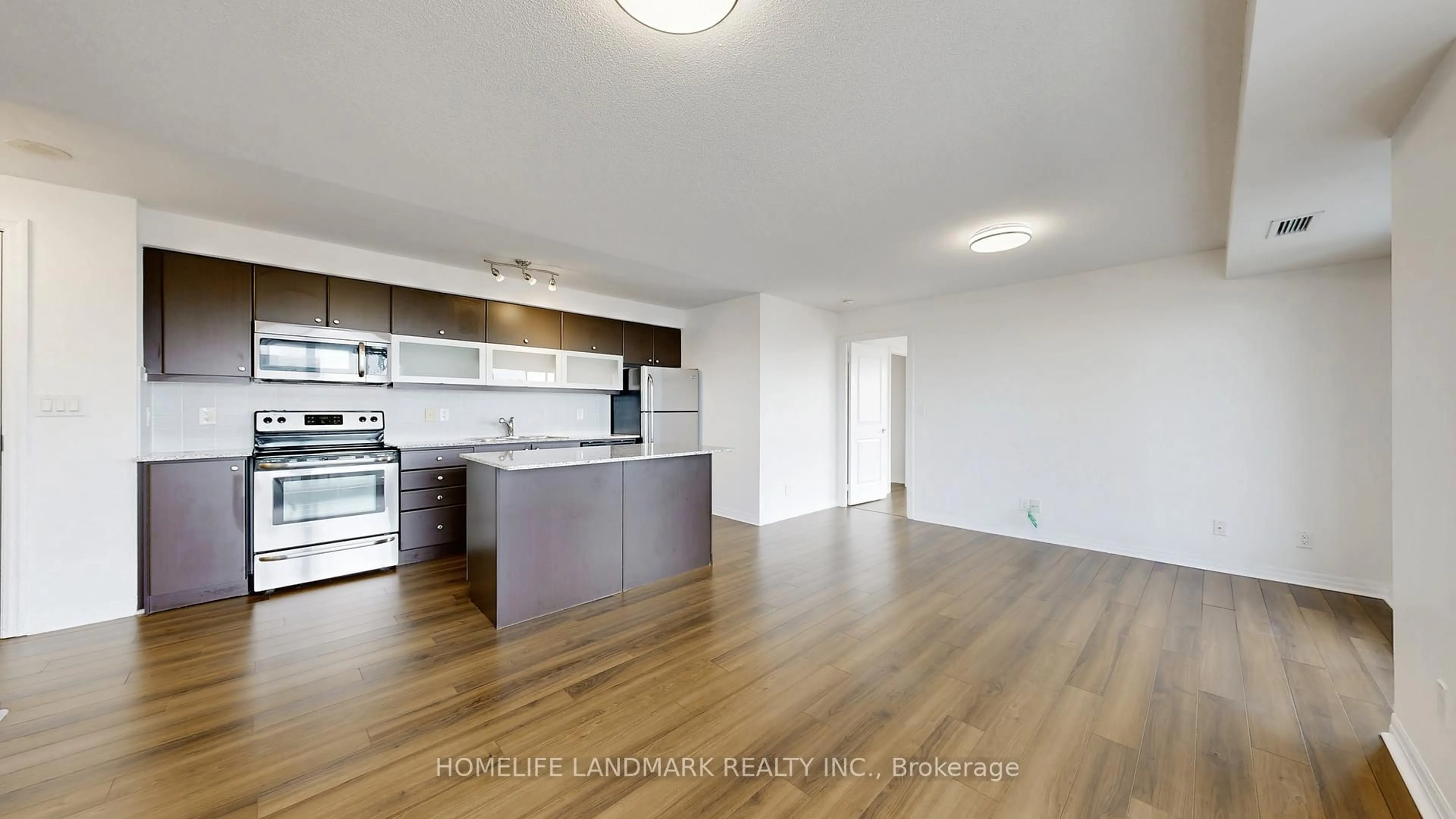 Open concept kitchen, wood/laminate floor for 2015 Sheppard Ave #1704, Toronto Ontario M2J 0B3