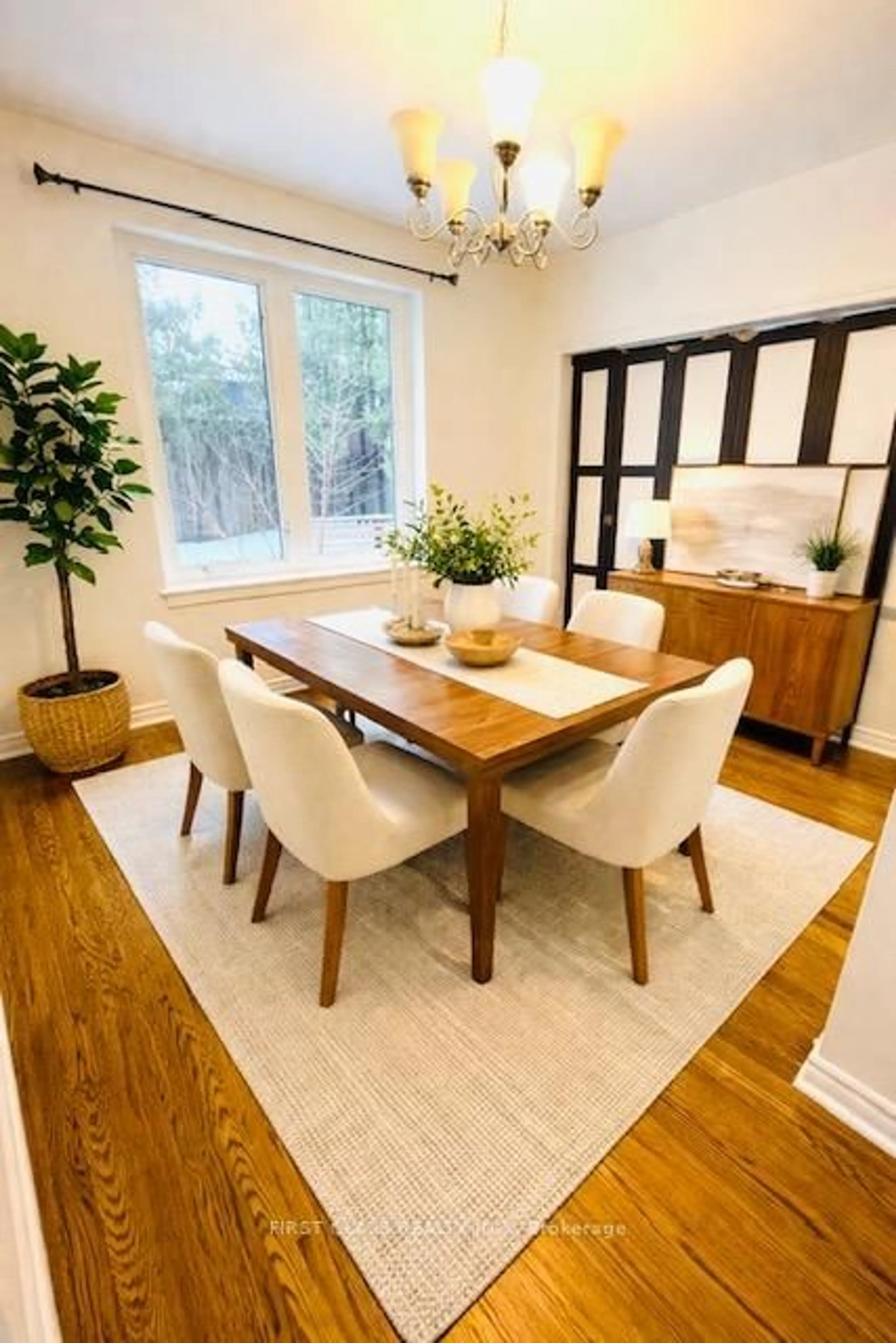 Dining room, wood/laminate floor for 48 Overton Cres, Toronto Ontario M3B 2V2