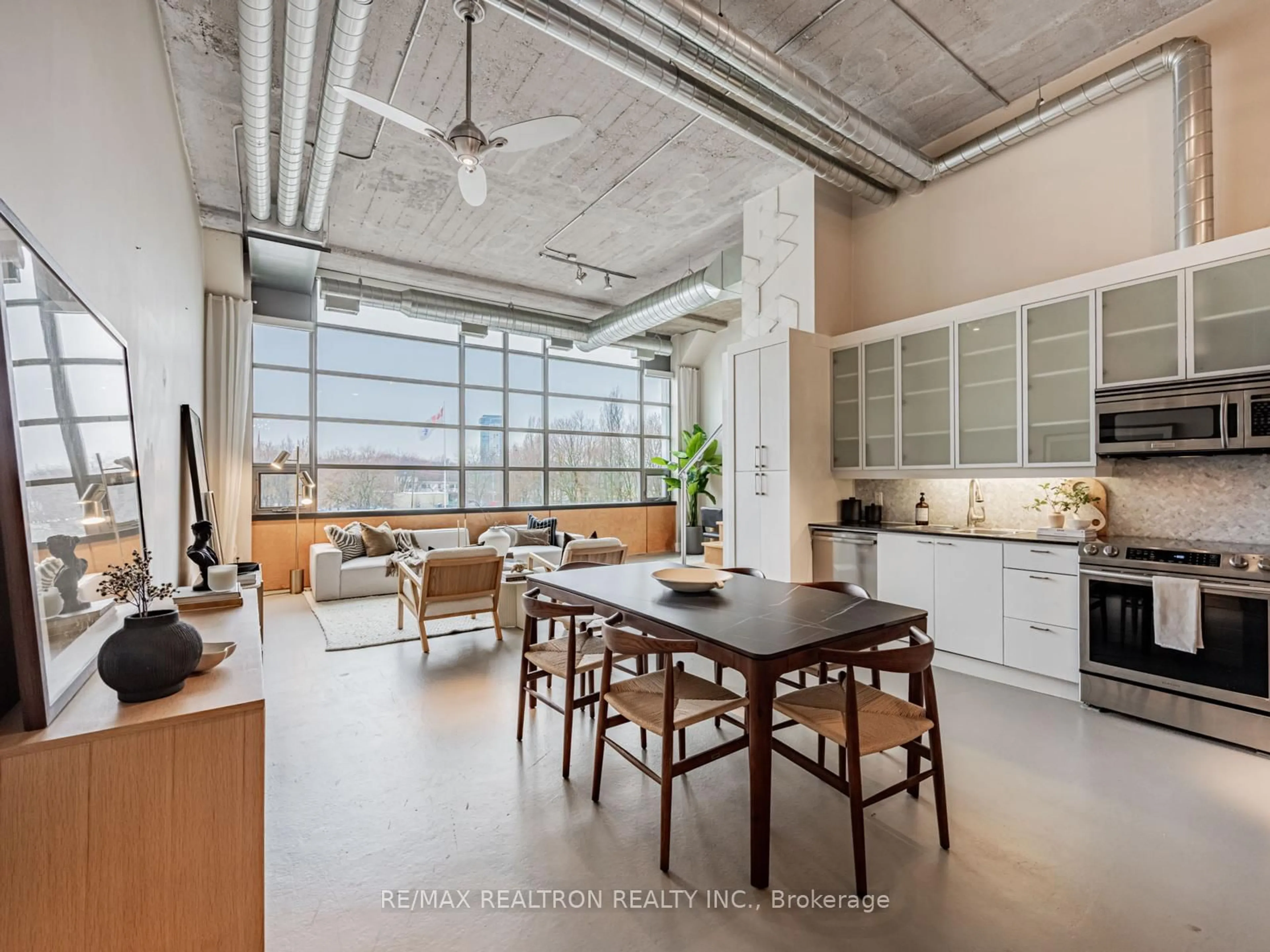 Open concept kitchen, cement floor for 637 Lake Shore Blvd #208, Toronto Ontario M5V 3J6