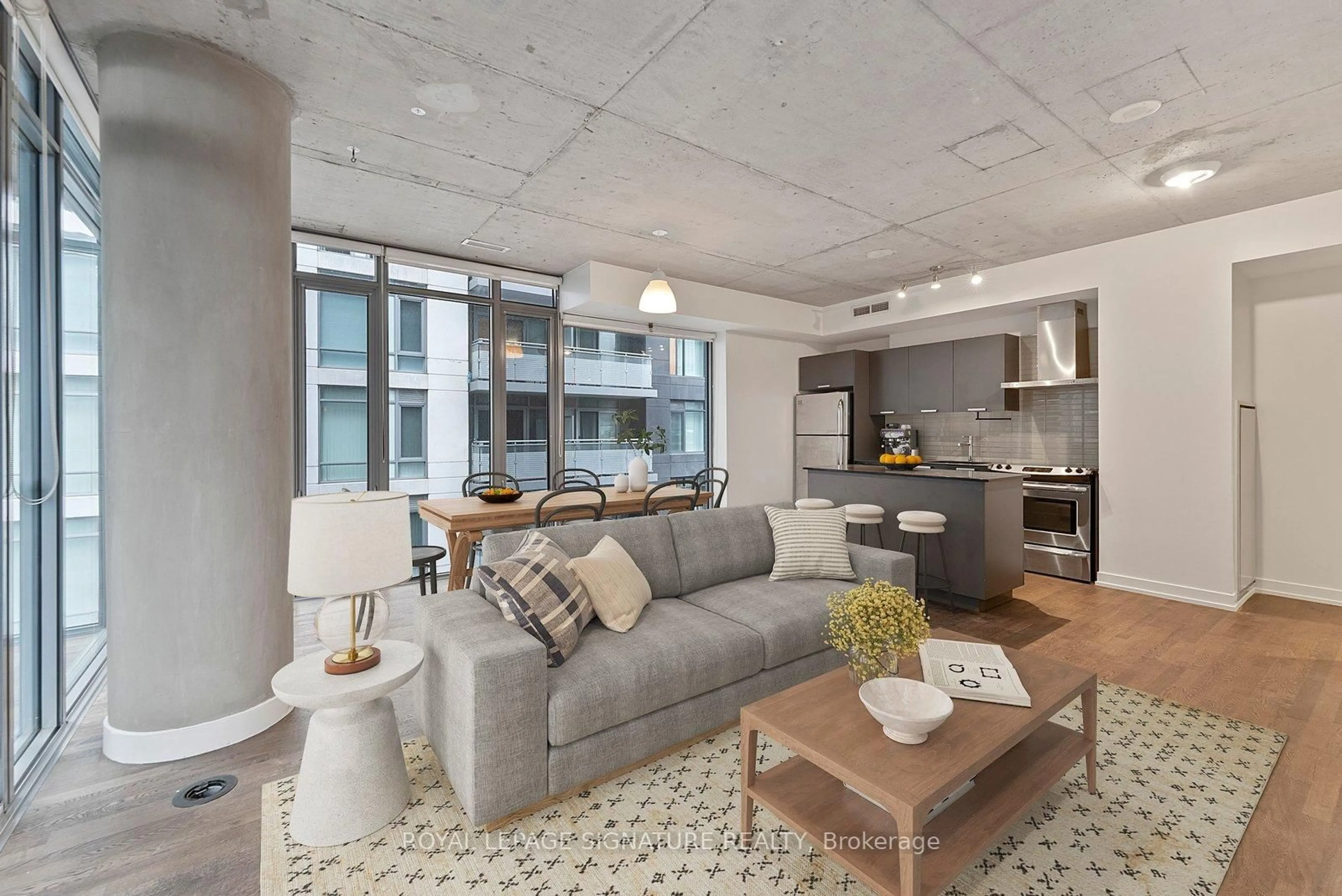 Living room with furniture, cement floor for 650 King St #505, Toronto Ontario M5V 1M5