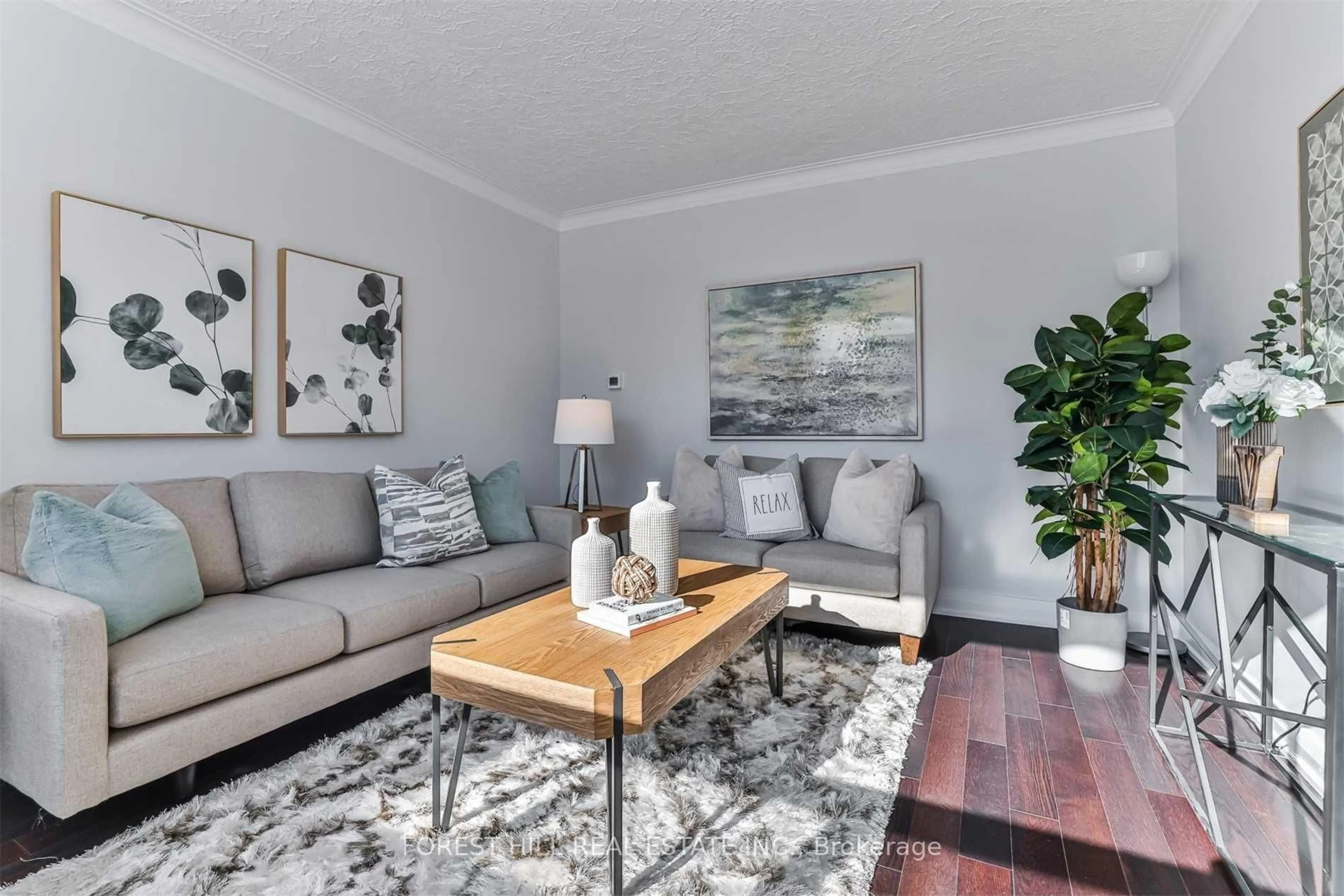 Living room with furniture, wood/laminate floor for 184 Finch Ave, Toronto Ontario M2N 4R9