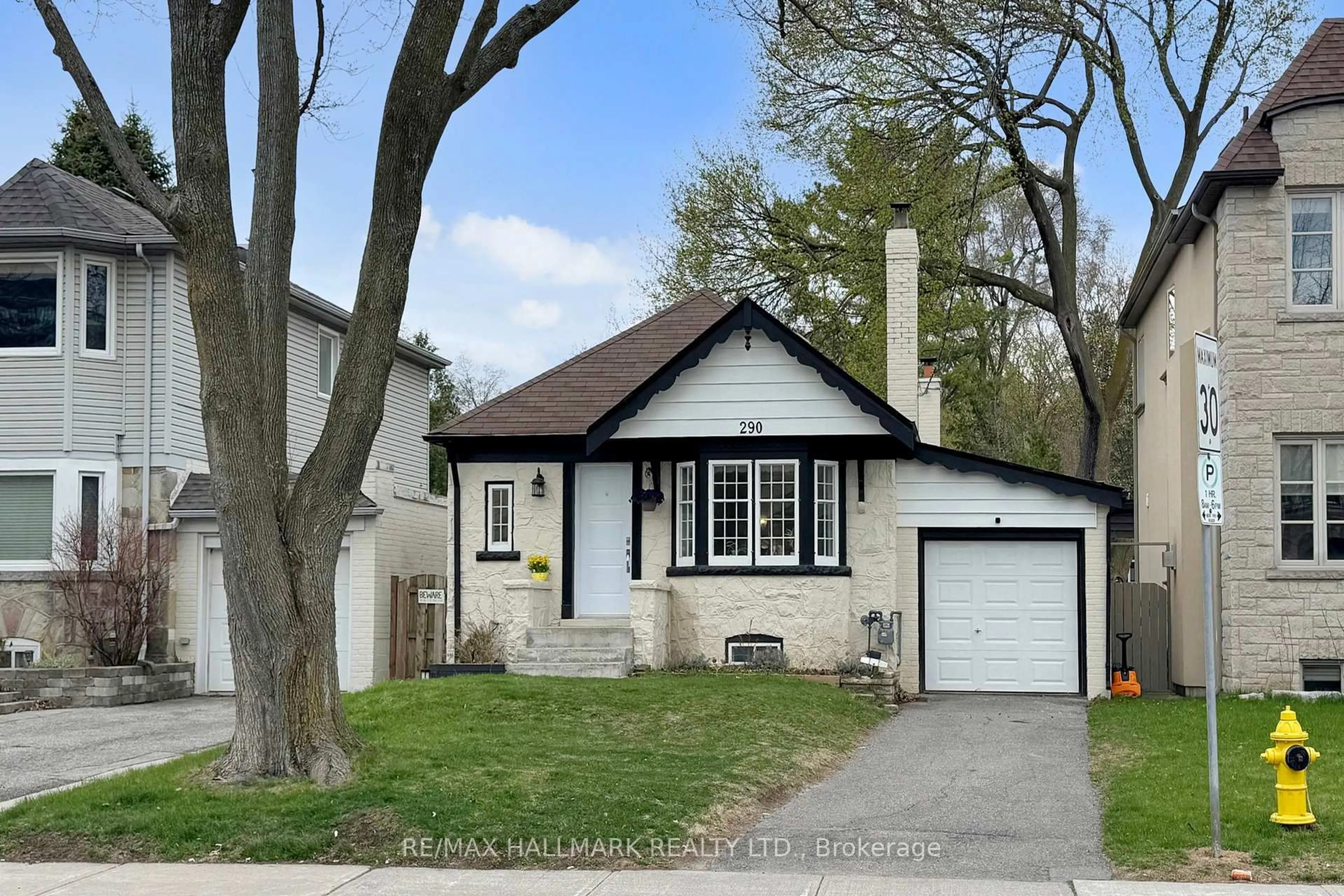 Home with vinyl exterior material, street for 290 Laird Dr, Toronto Ontario M4G 3X5