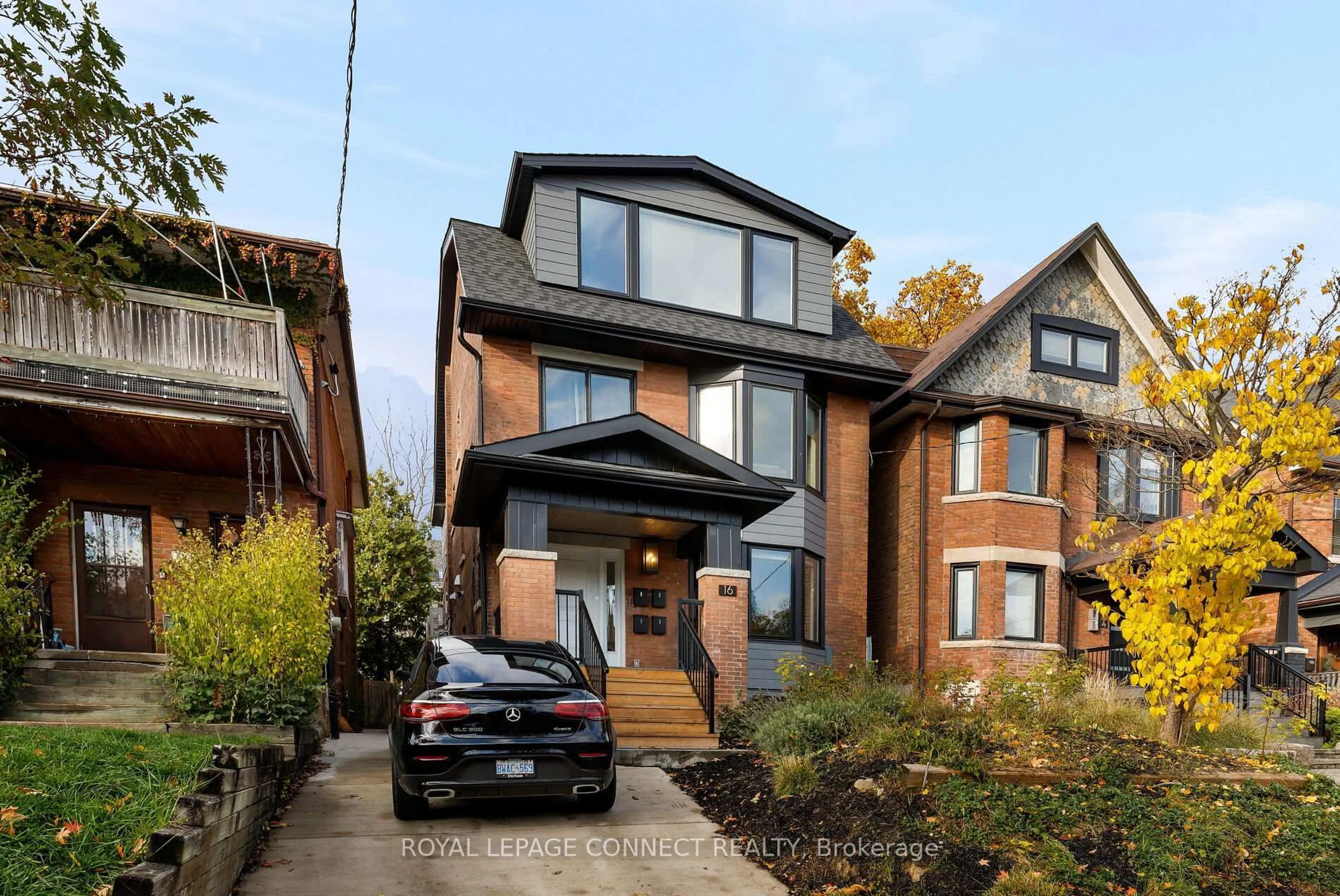 Home with brick exterior material, street for 16 Rosemount Ave, Toronto Ontario M6H 2M1