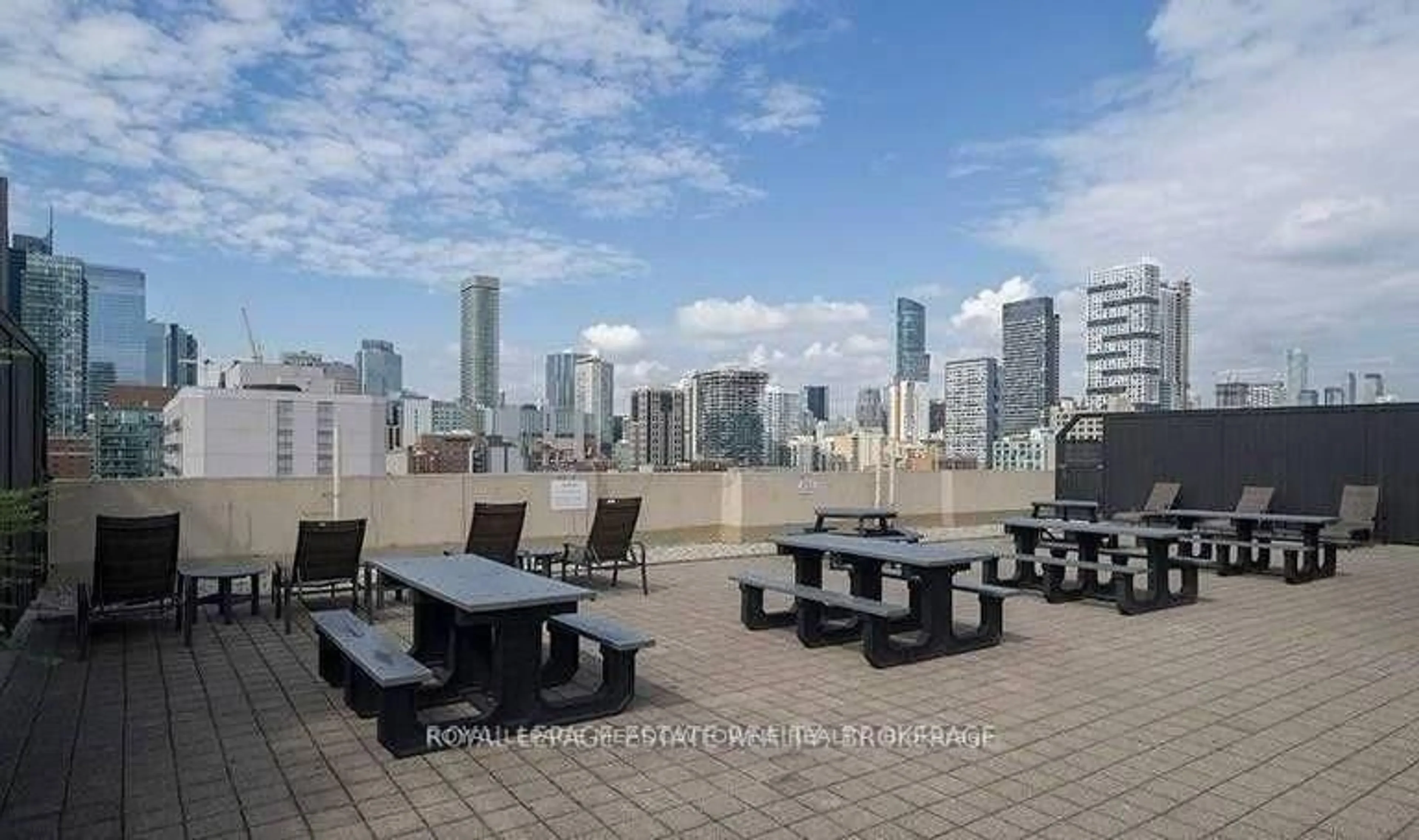 Patio, city buildings view from balcony for 313 Richmond St #156, Toronto Ontario M5A 4S7
