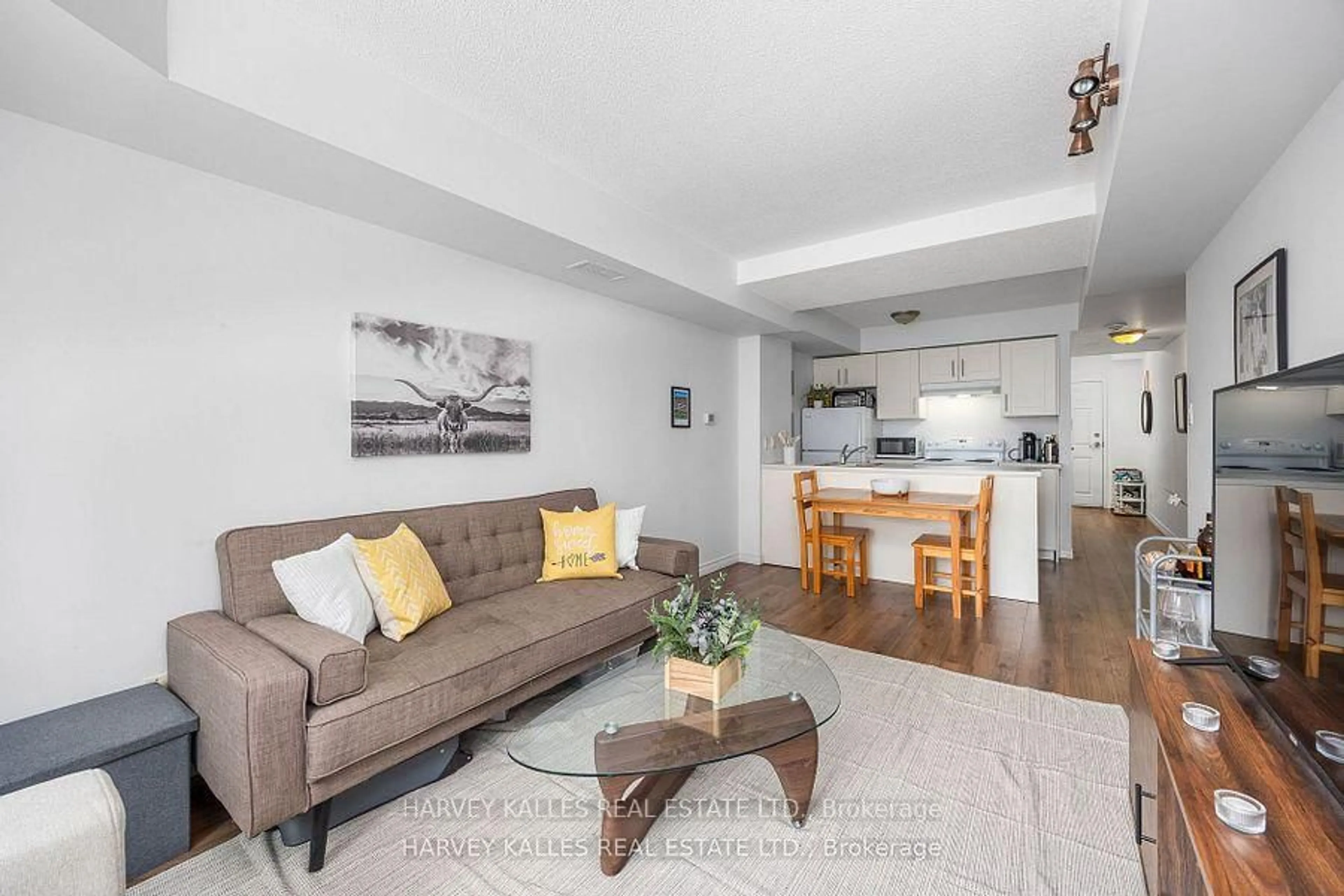 Living room with furniture, unknown for 15 Maplewood Ave #212, Toronto Ontario M6C 4B4