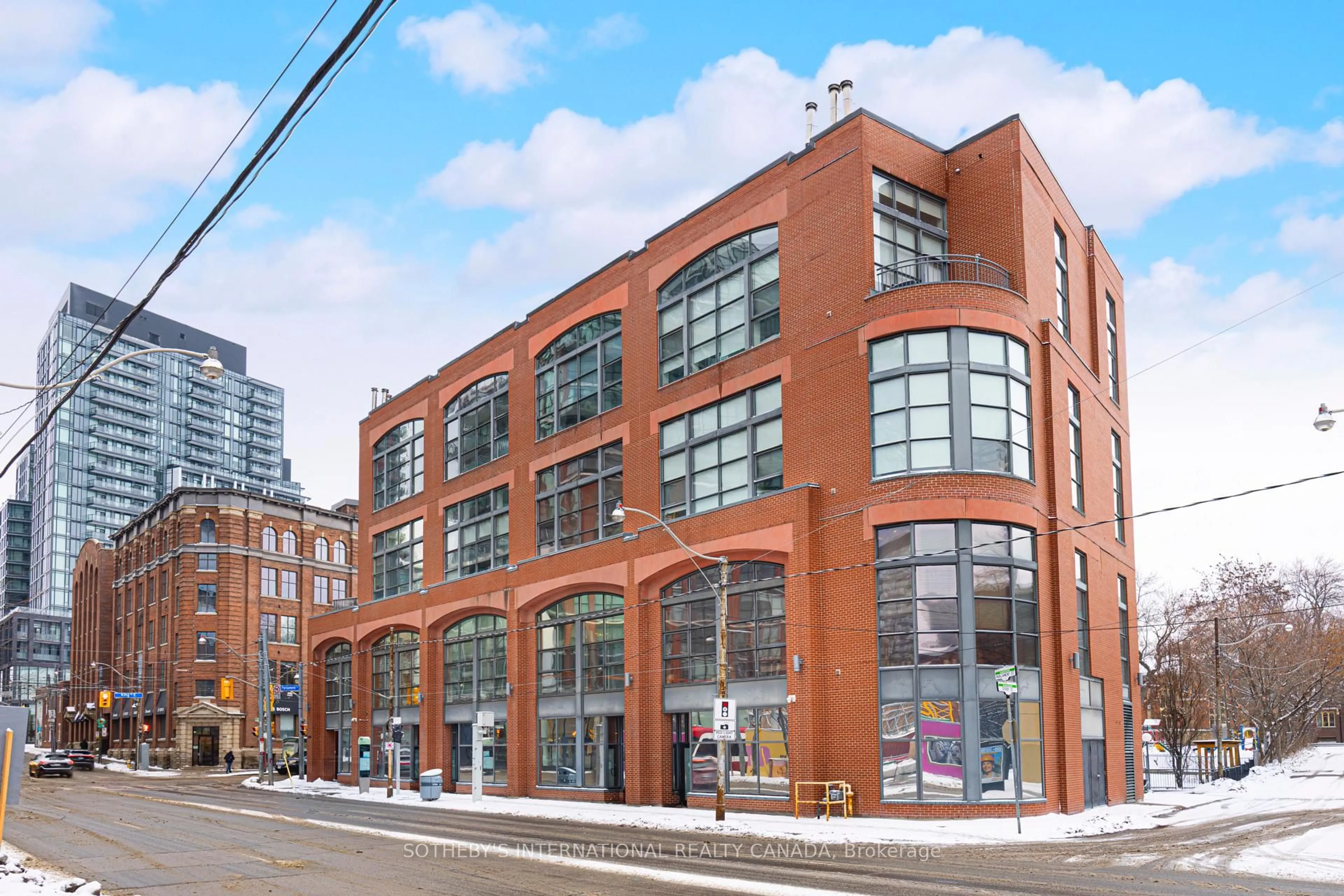 Home with brick exterior material, building for 393 King St #202, Toronto Ontario M5A 1L3