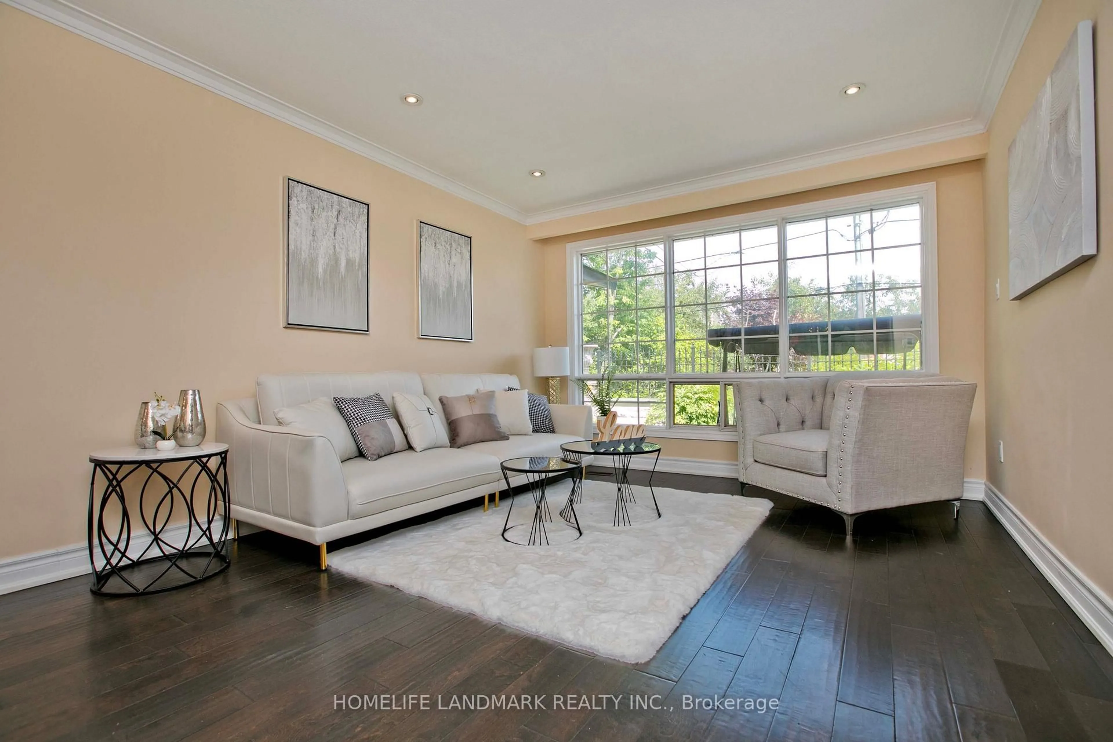 Living room with furniture, wood/laminate floor for 157 Pleasant View Dr, Toronto Ontario M2J 3R3