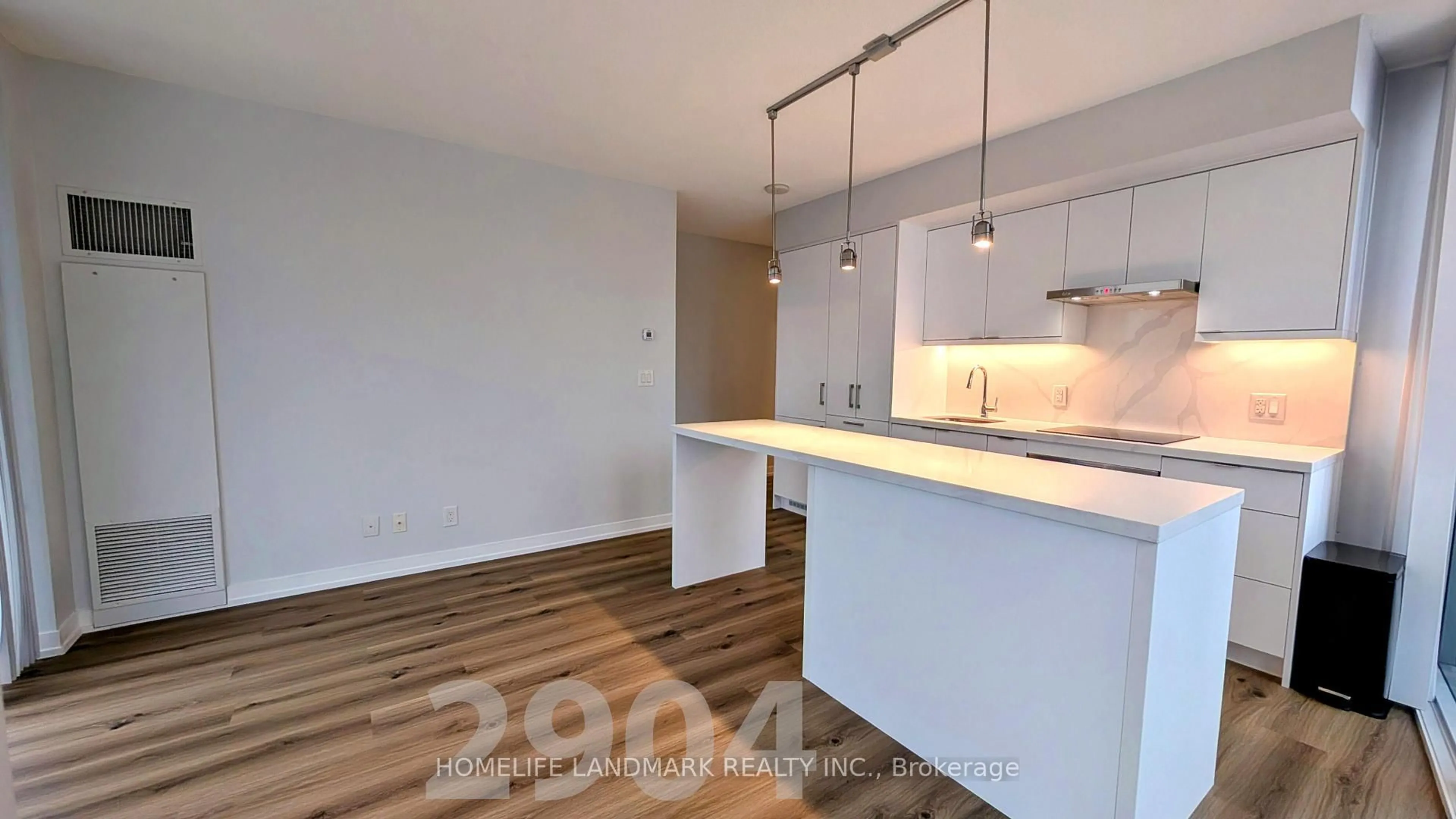 Open concept kitchen, wood/laminate floor for 88 Harbour St #2904, Toronto Ontario M5J 0C3