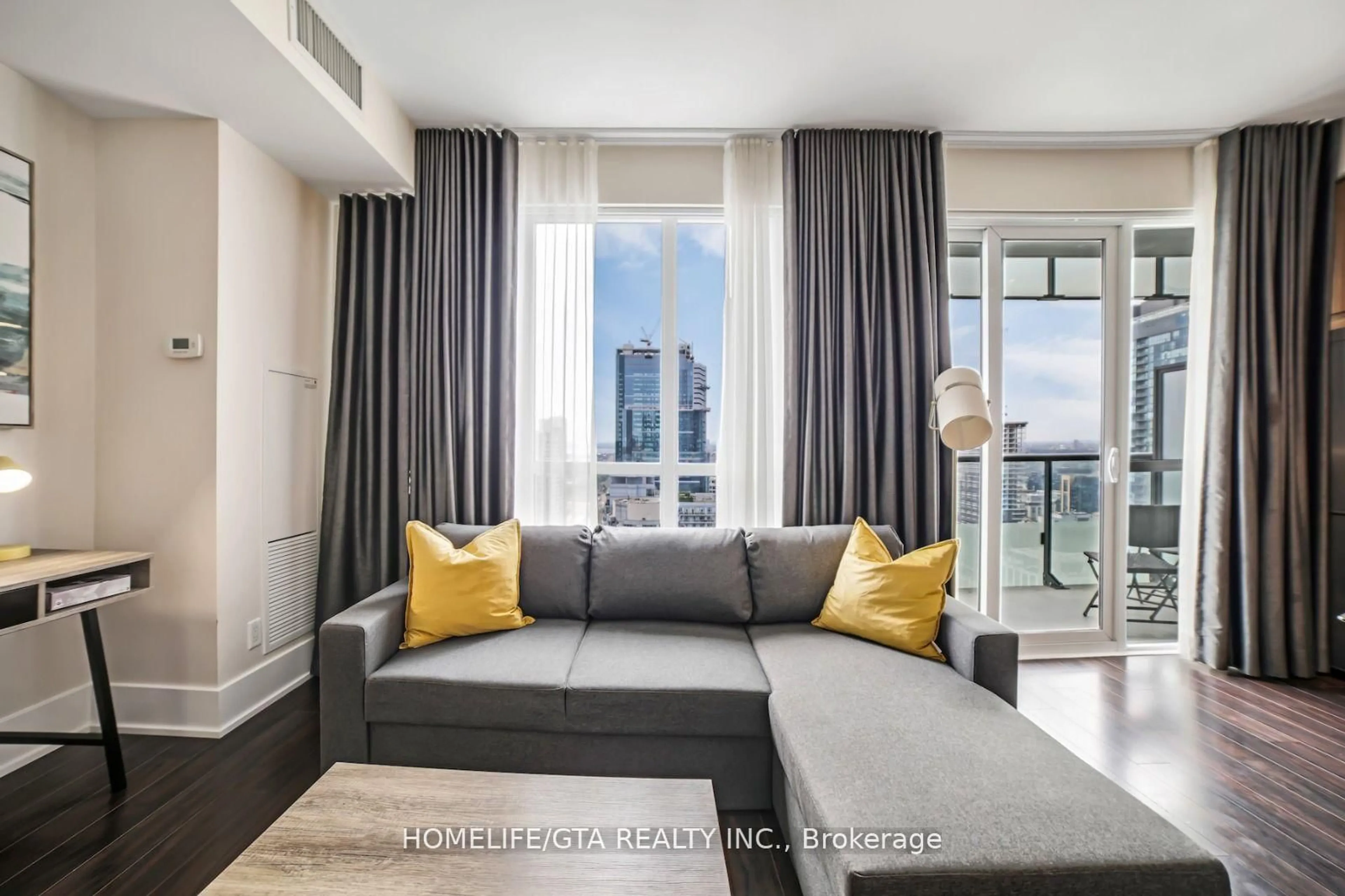 Living room with furniture, unknown for 300 Front St #3214, Toronto Ontario M5V 0E9