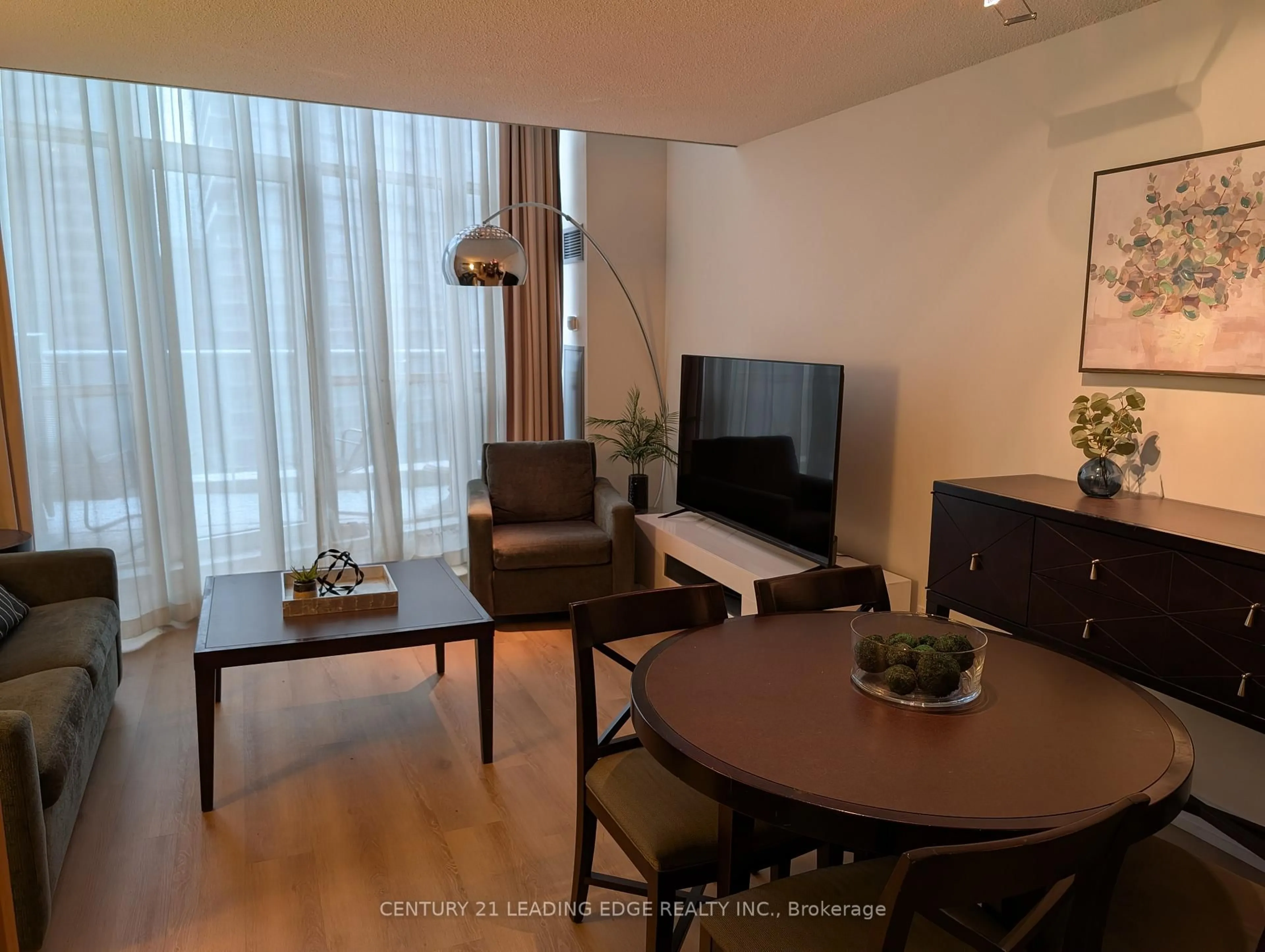 Living room with furniture, wood/laminate floor for 36 Blue Jays Way #723, Toronto Ontario M5V 3T3