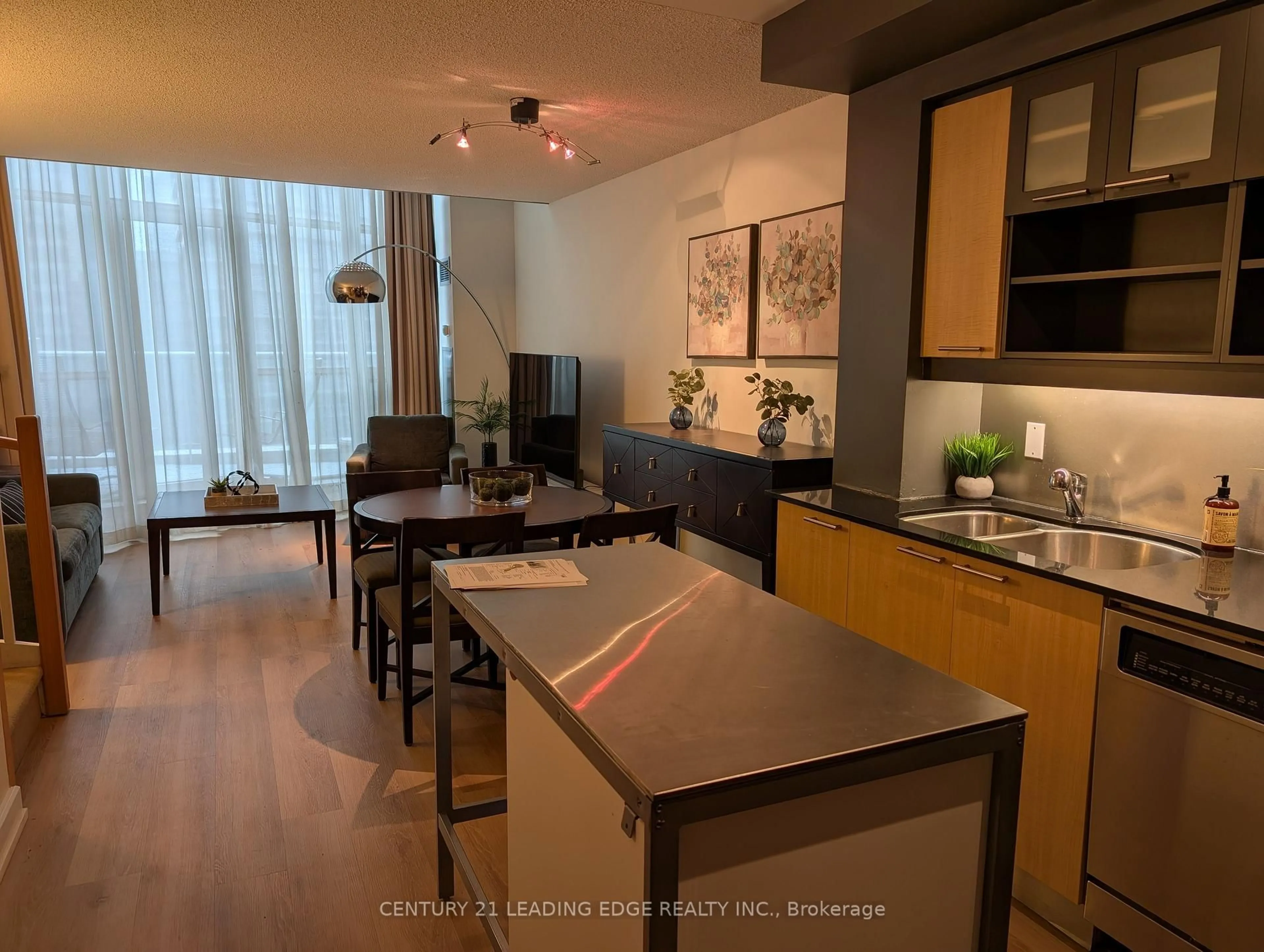 Open concept kitchen, wood/laminate floor for 36 Blue Jays Way #723, Toronto Ontario M5V 3T3