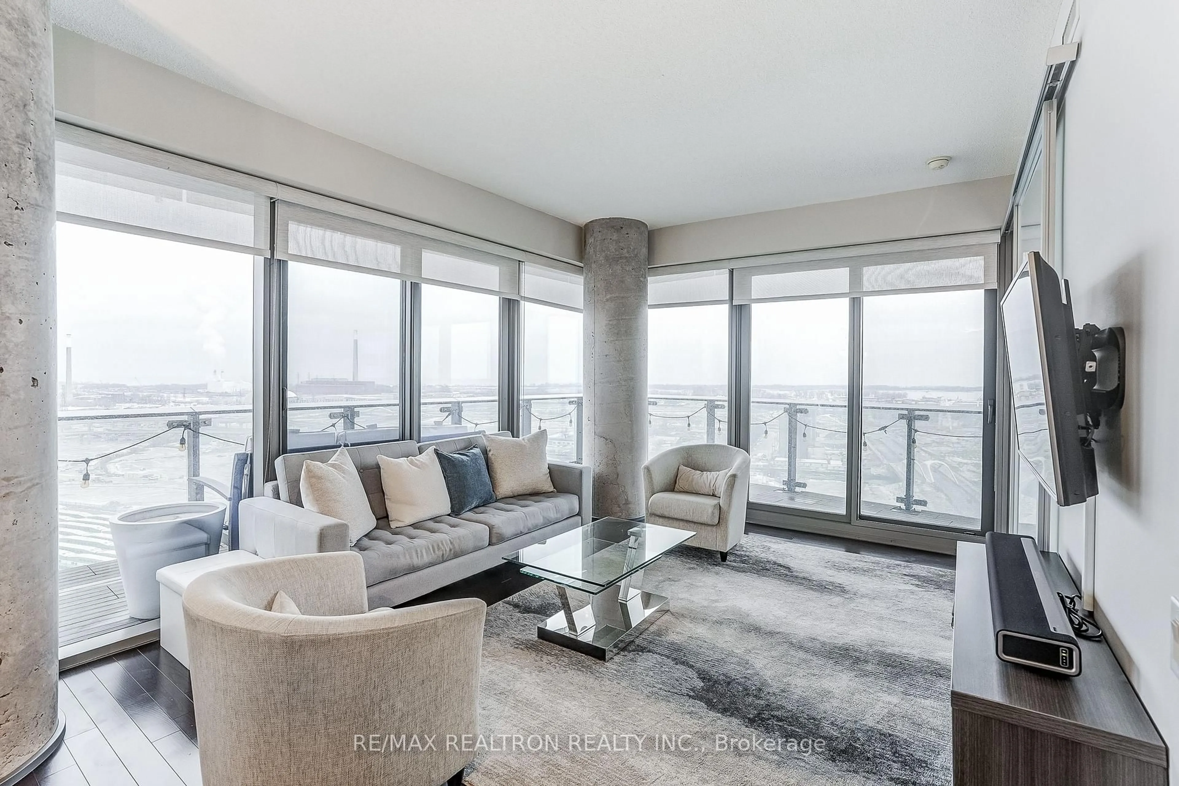 Living room with furniture, cement floor for 390 Cherry St #2107, Toronto Ontario M5A 0E2