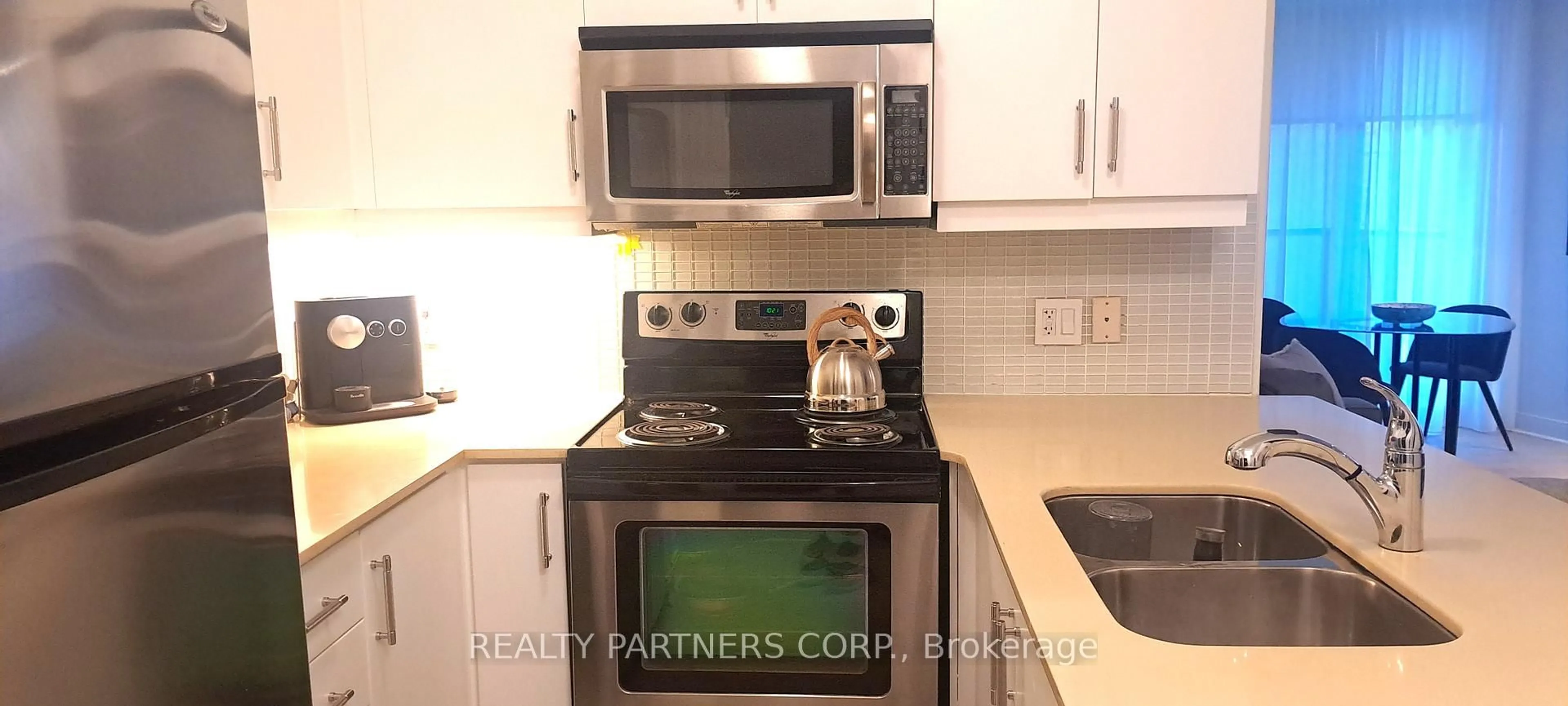 Standard kitchen, wood/laminate floor for 1 Scott St #507, Toronto Ontario M5E 1A1