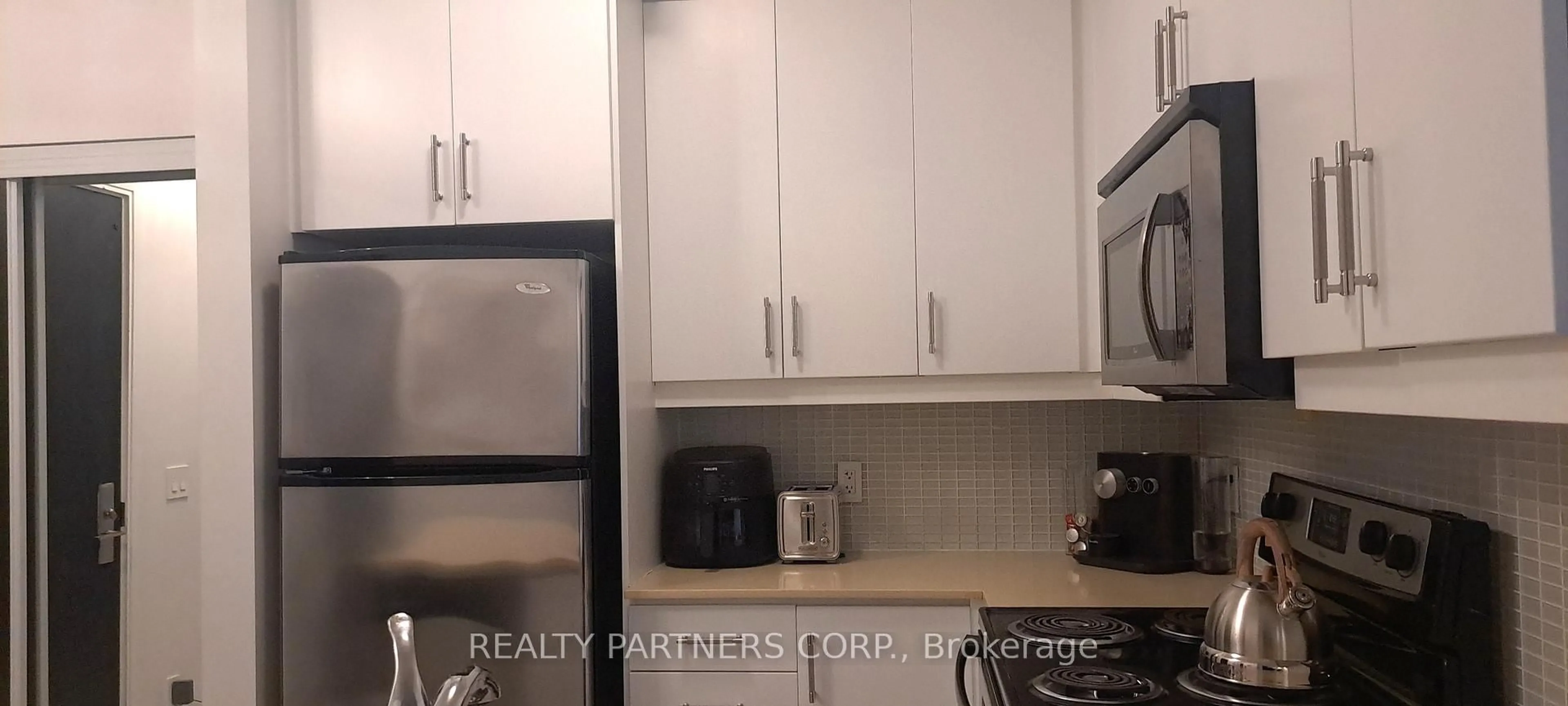 Standard kitchen, unknown for 1 Scott St #507, Toronto Ontario M5E 1A1