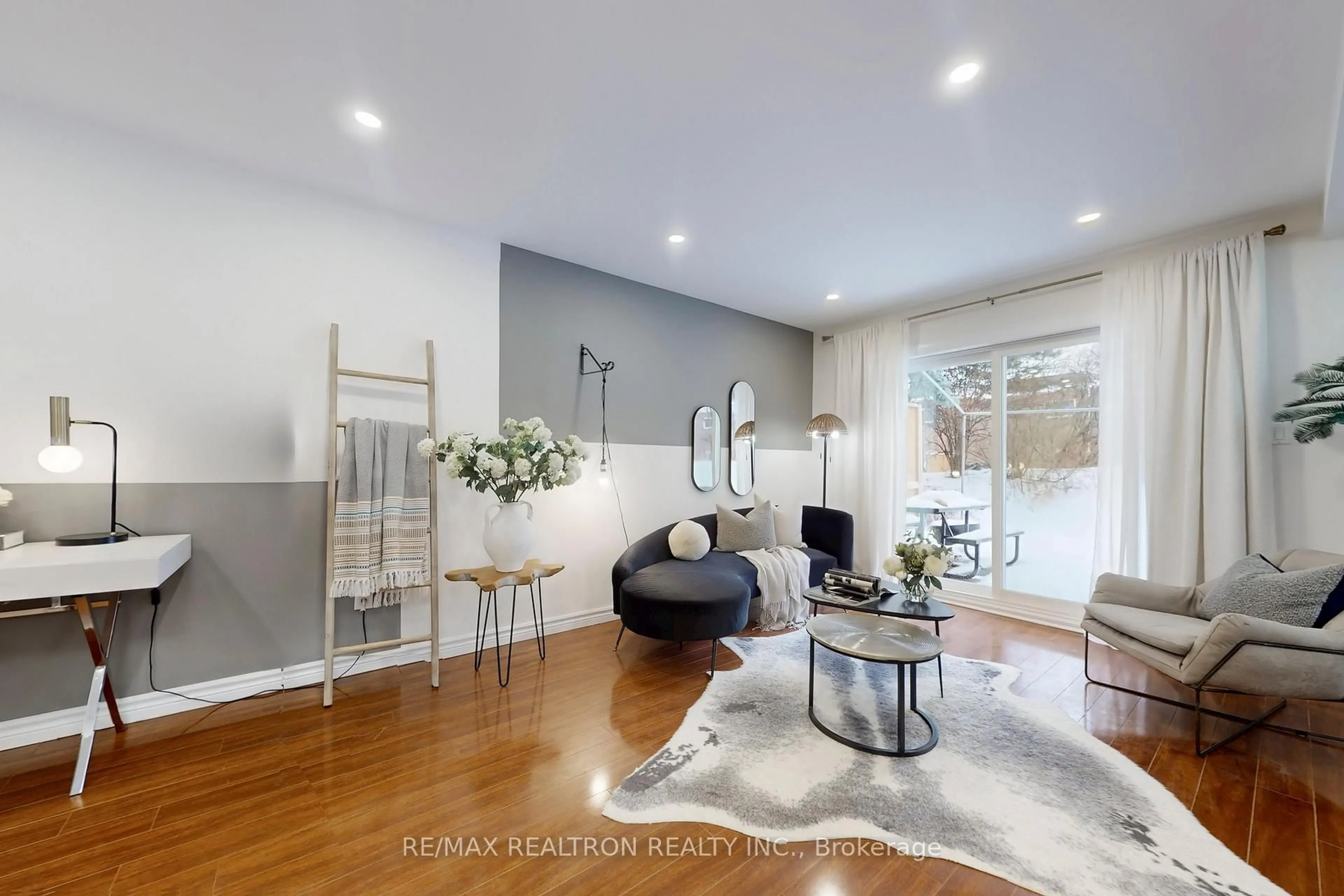 Living room with furniture, wood/laminate floor for 25 Esterbrooke Ave #118, Toronto Ontario M2J 2C5