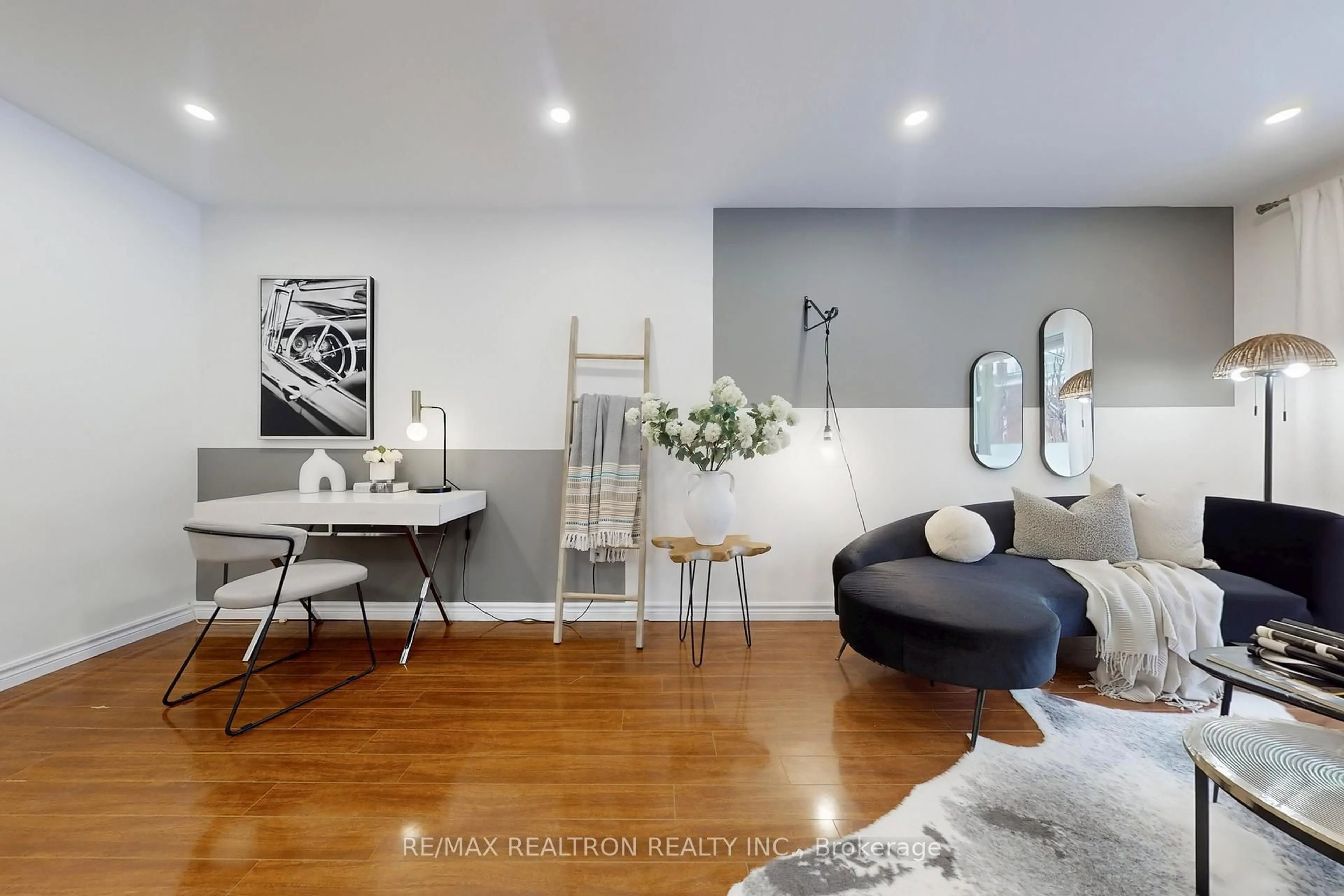 Living room with furniture, wood/laminate floor for 25 Esterbrooke Ave #118, Toronto Ontario M2J 2C5