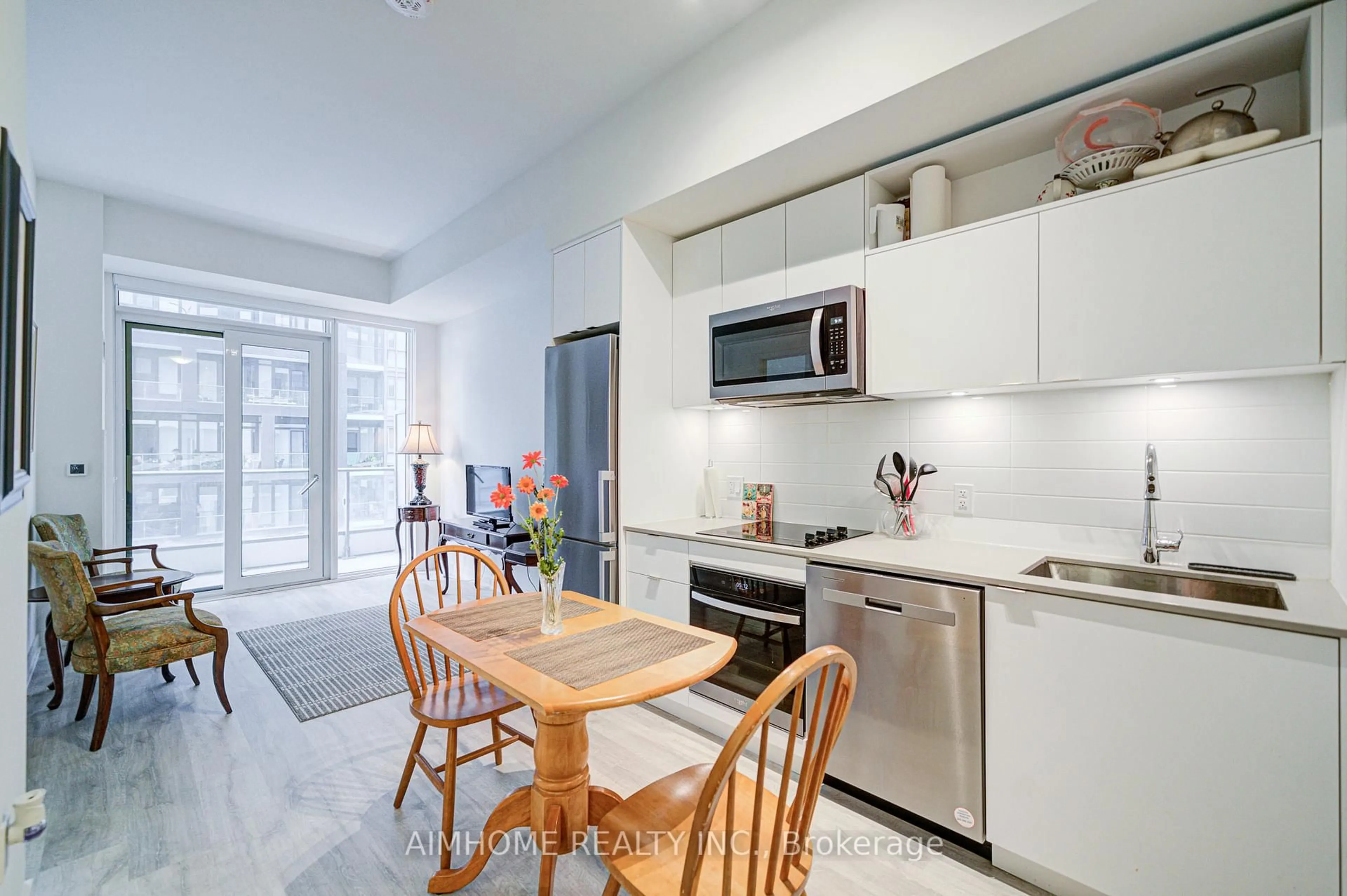 Open concept kitchen, ceramic/tile floor for 70 Princess St #1723, Toronto Ontario M5A 0X6