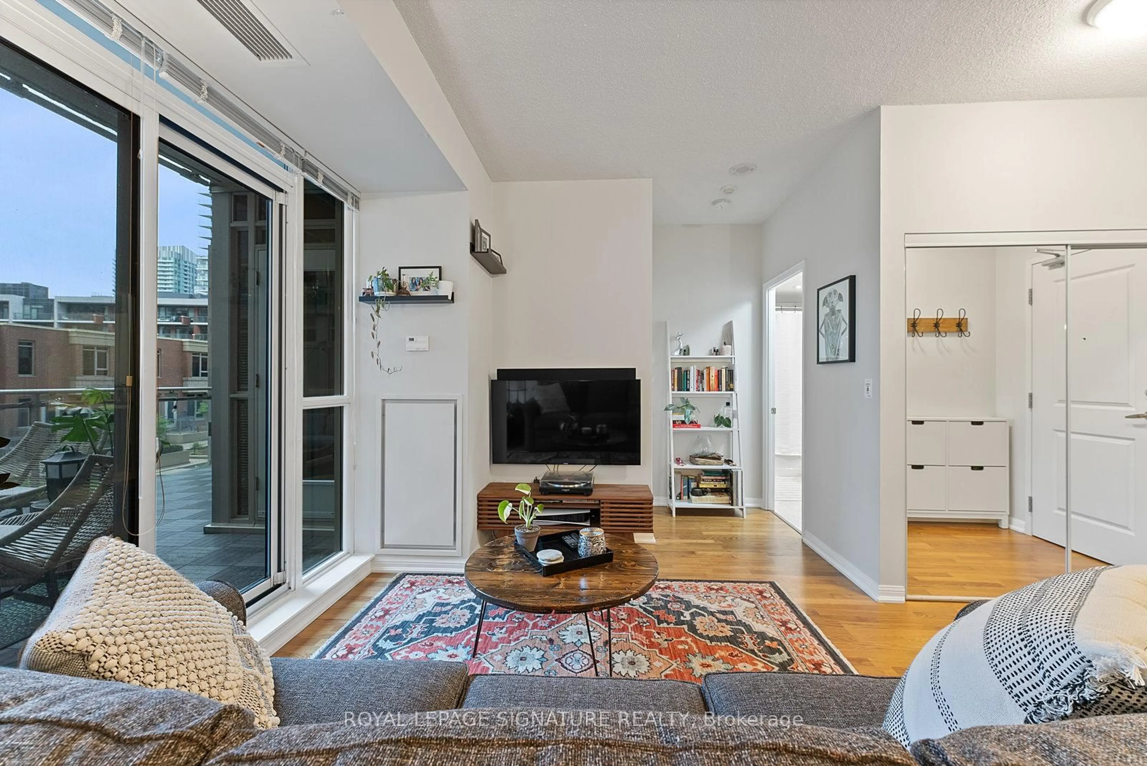 Living room with furniture, unknown for 628 Fleet St #316, Toronto Ontario M5V 1A9