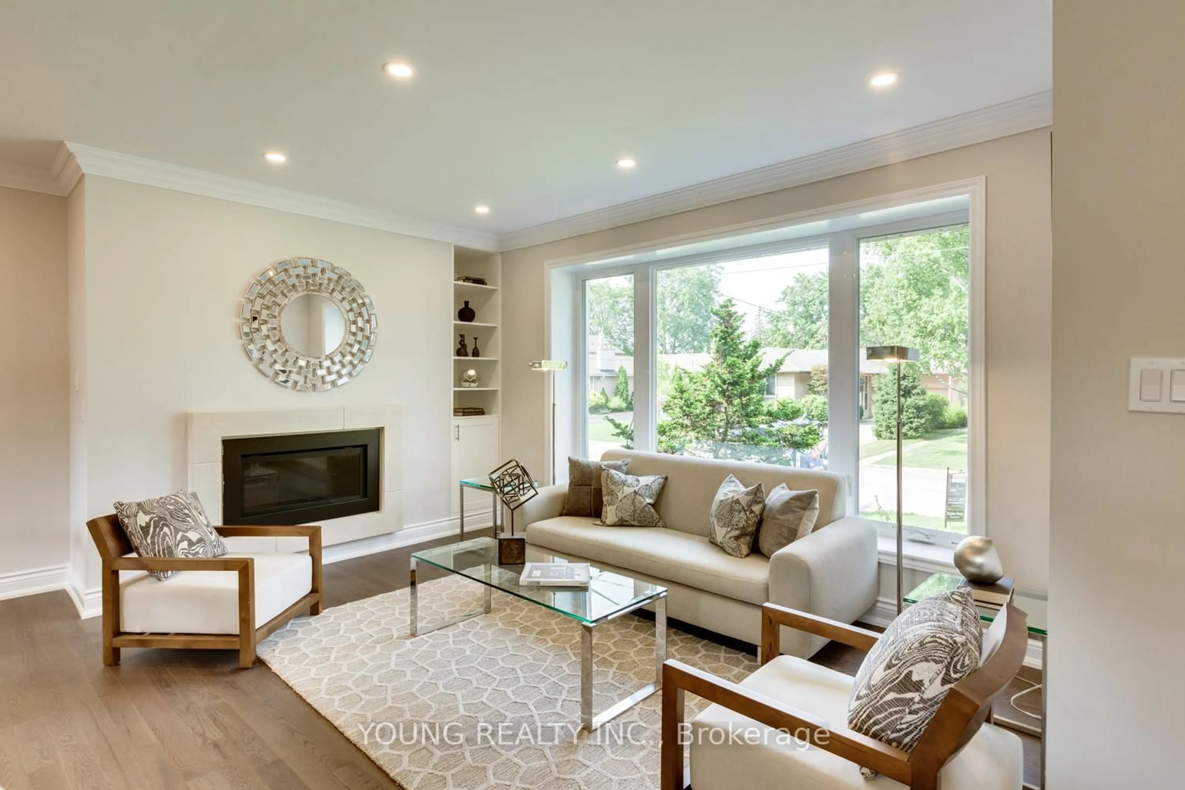 Living room with furniture, wood/laminate floor for 21 Bathford Cres, Toronto Ontario M2J 2S3