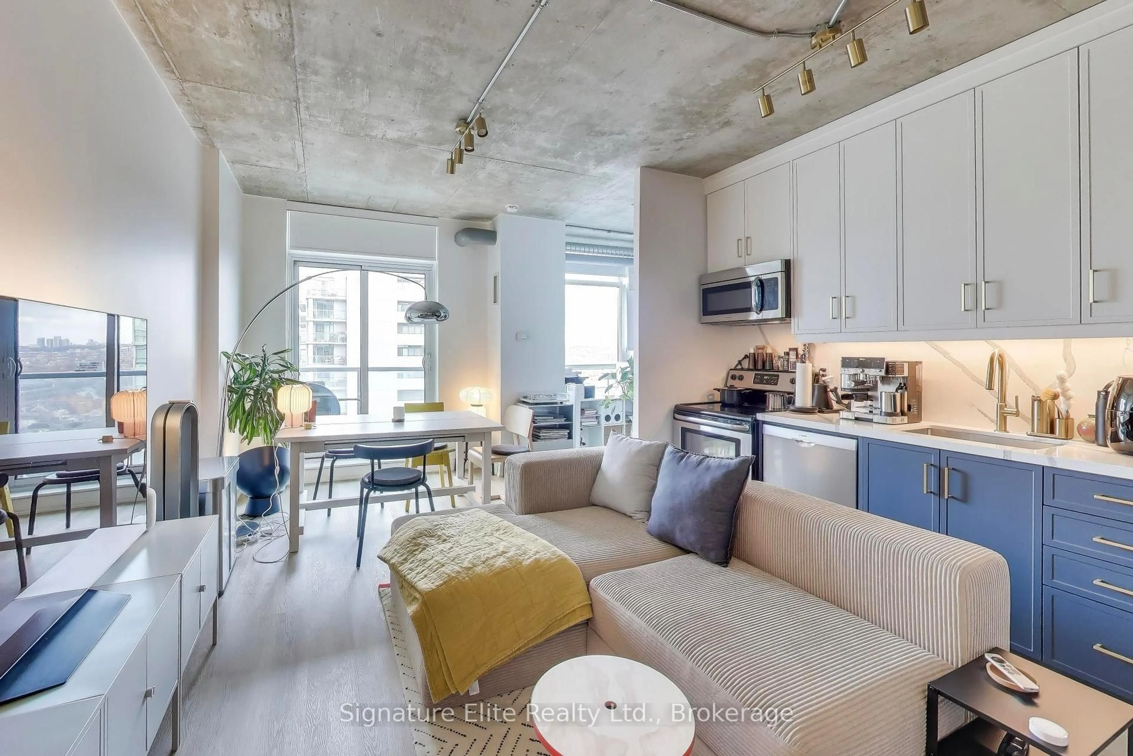 Open concept kitchen, cement floor for 150 Sudbury St #1703, Toronto Ontario M6J 3S8