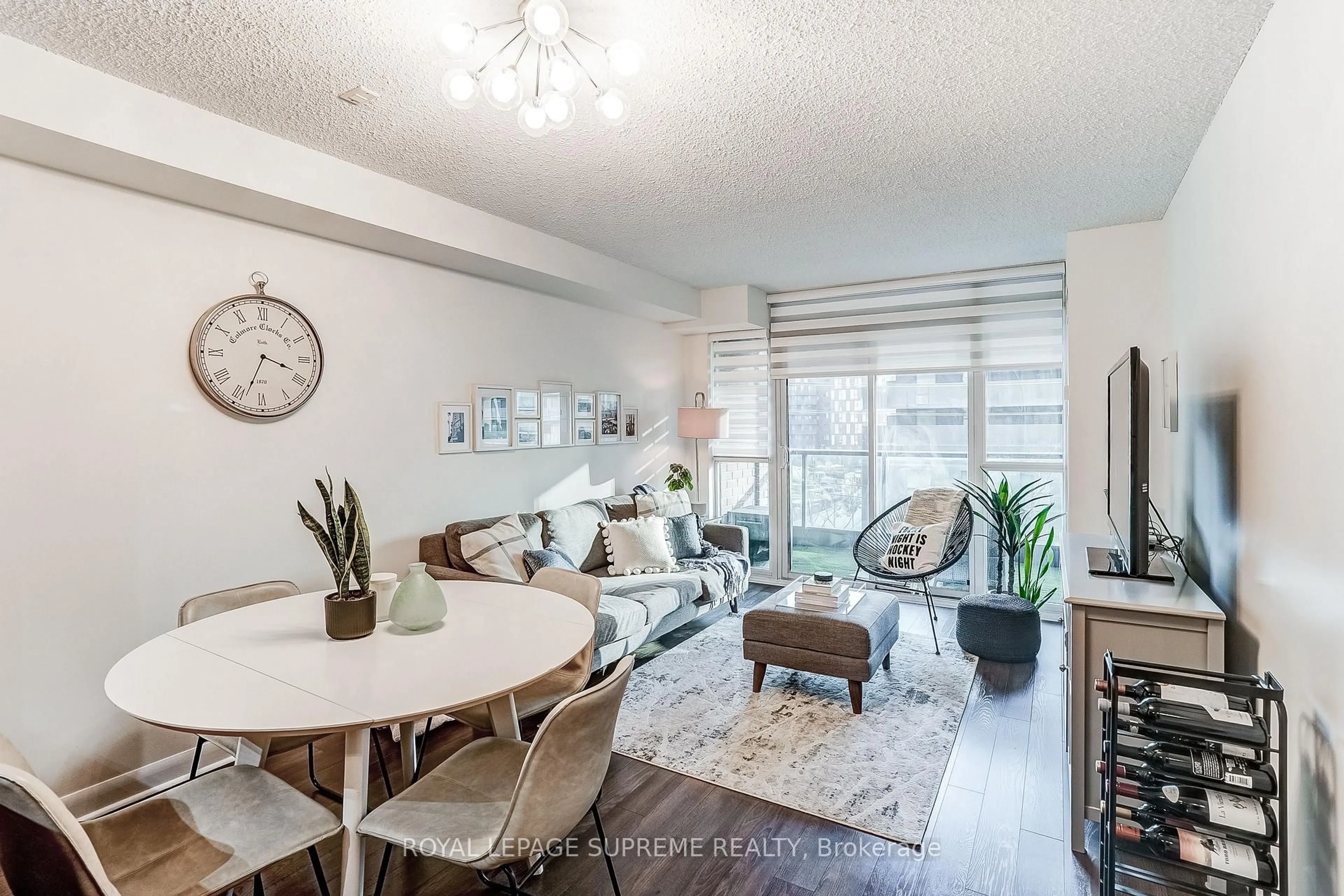 Living room with furniture, wood/laminate floor for 525 wilson Ave #459, Toronto Ontario M3H 0A7