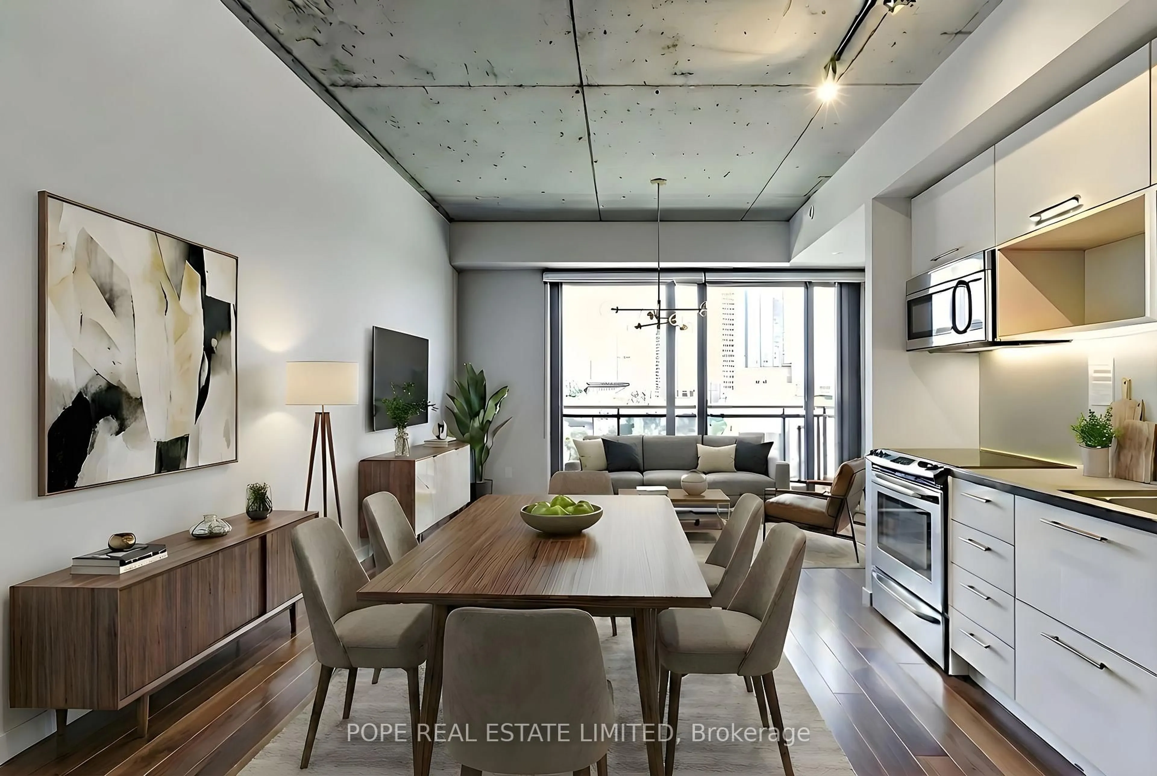 Open concept kitchen, cement floor for 51 Trolley Cres #719, Toronto Ontario M5A 0E9