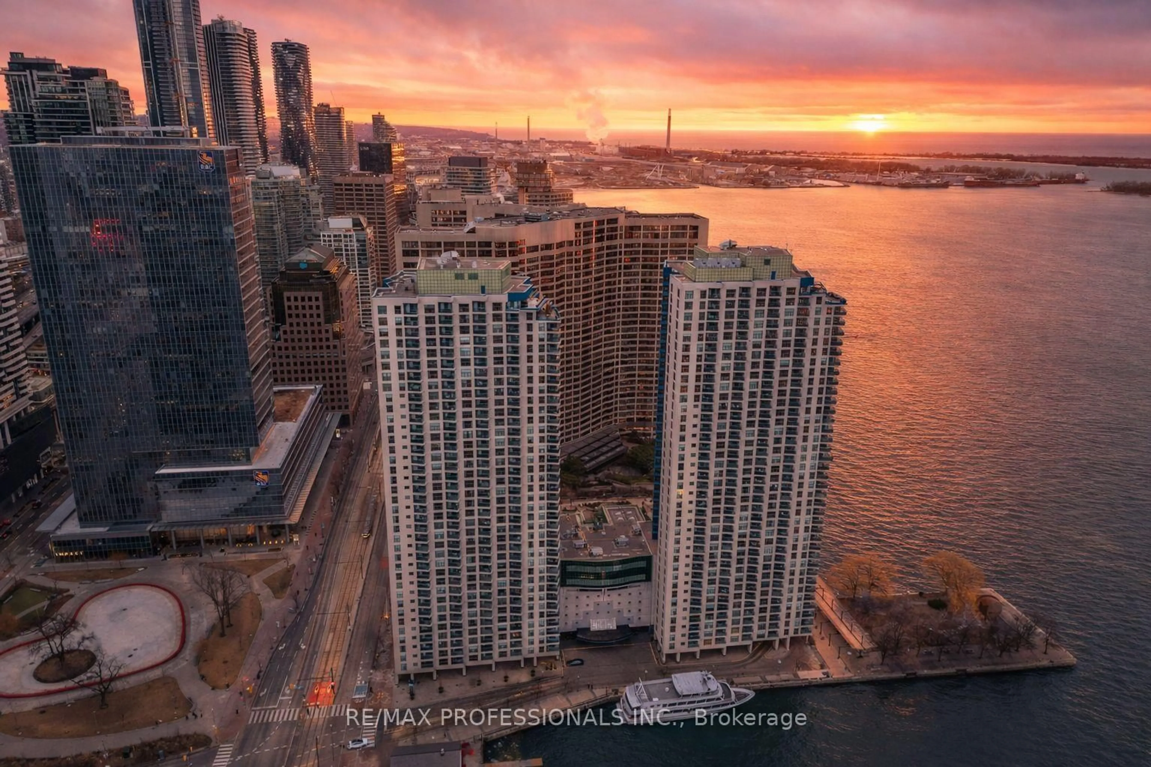 A pic from outside/outdoor area/front of a property/back of a property/a pic from drone, city buildings view from balcony for 77 Harbour Sq #3703, Toronto Ontario M5J 2S2