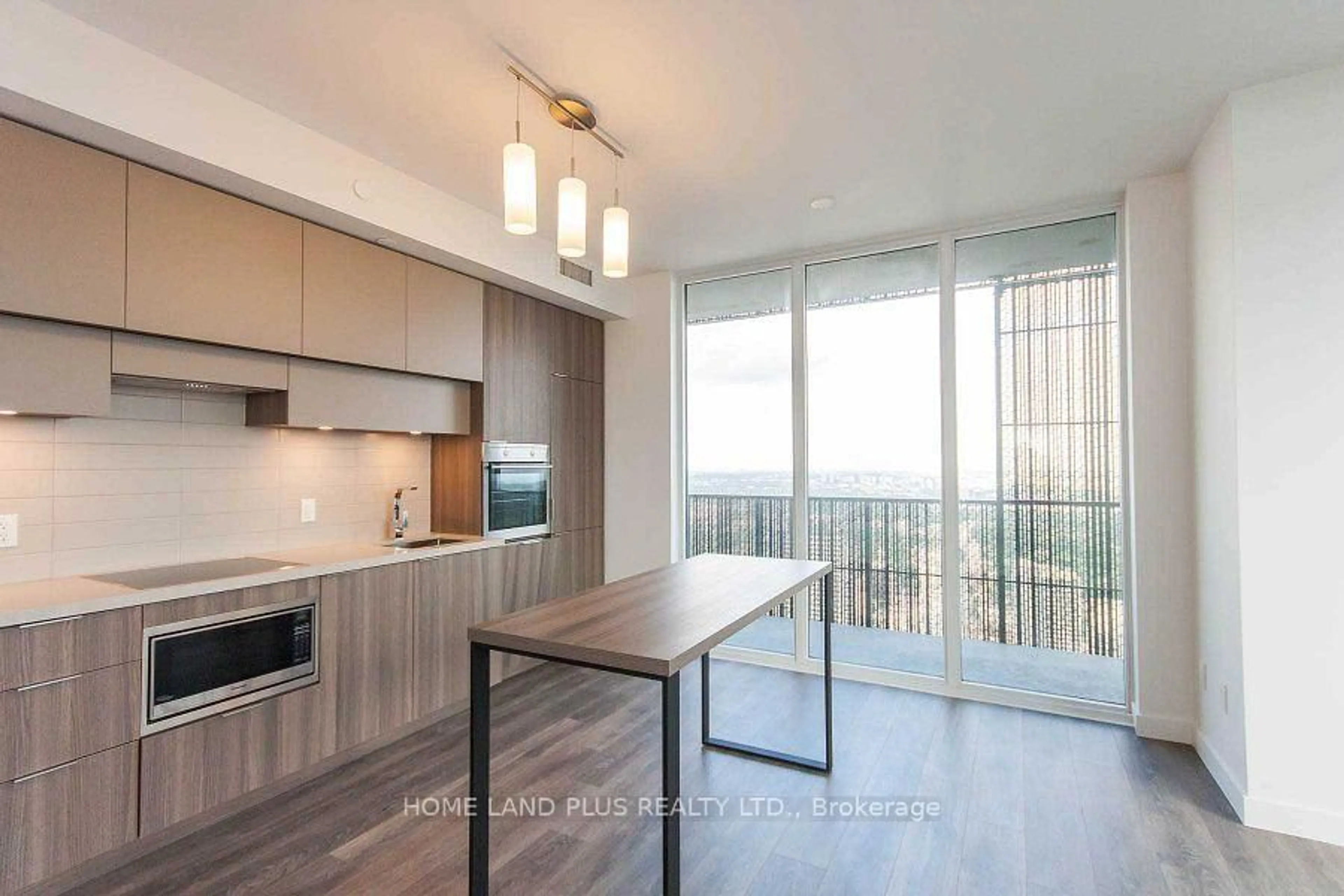 Open concept kitchen, wood/laminate floor for 8 Eglinton Ave #5111, Toronto Ontario M4P 0C1