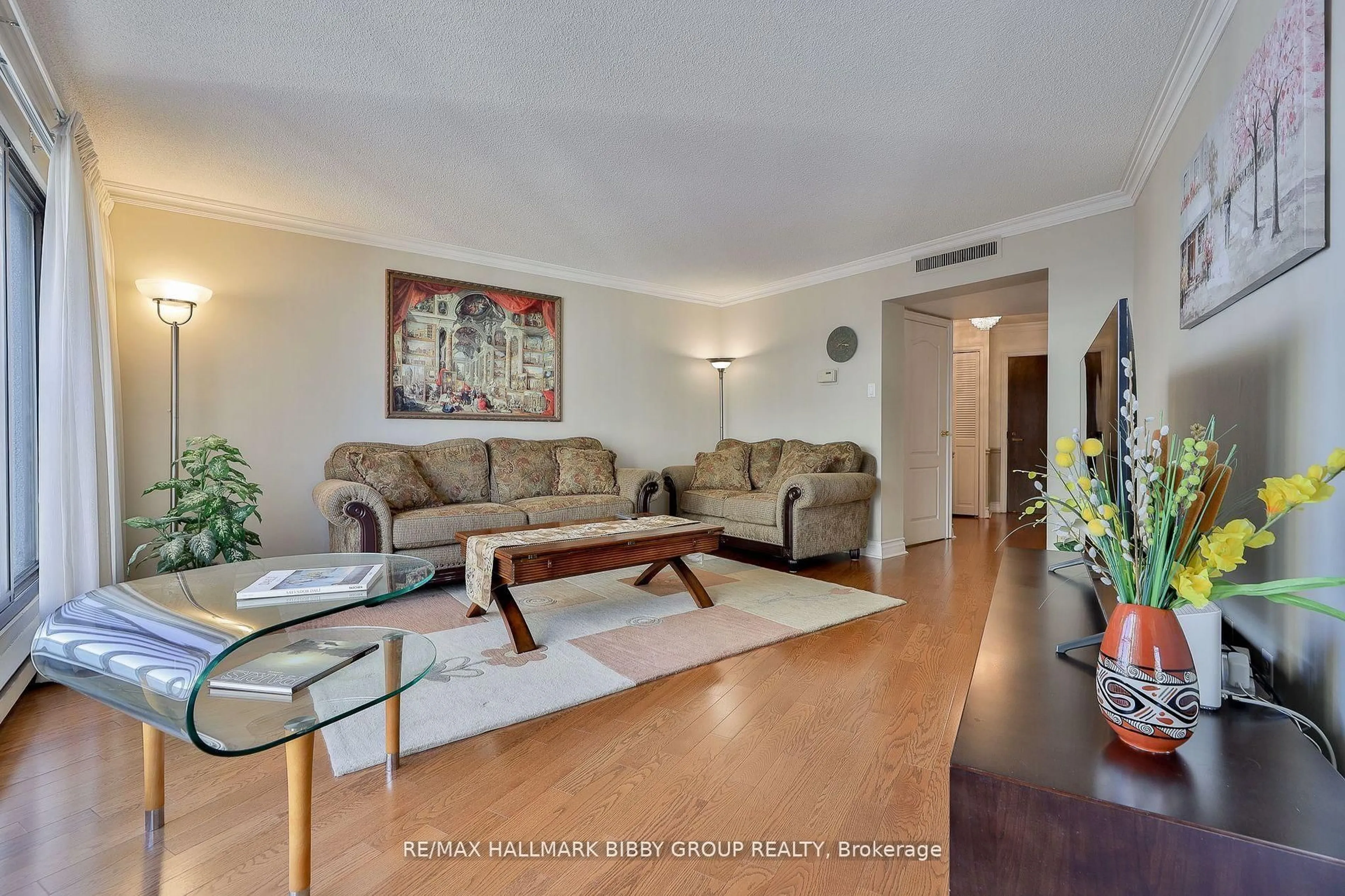 Living room with furniture, wood/laminate floor for 65 Harbour Sq #3006, Toronto Ontario M5J 2L4