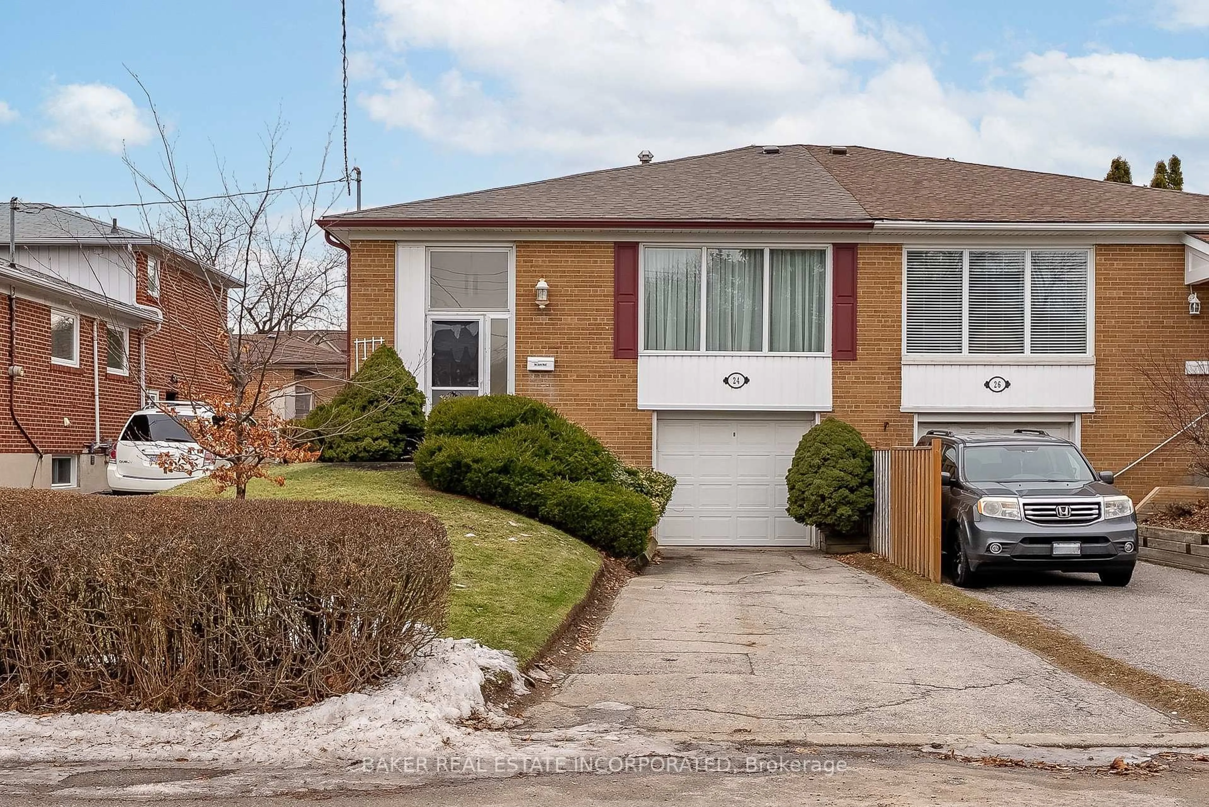 Home with brick exterior material, street for 24 Pinebrook Ave, Toronto Ontario M4A 1Y9